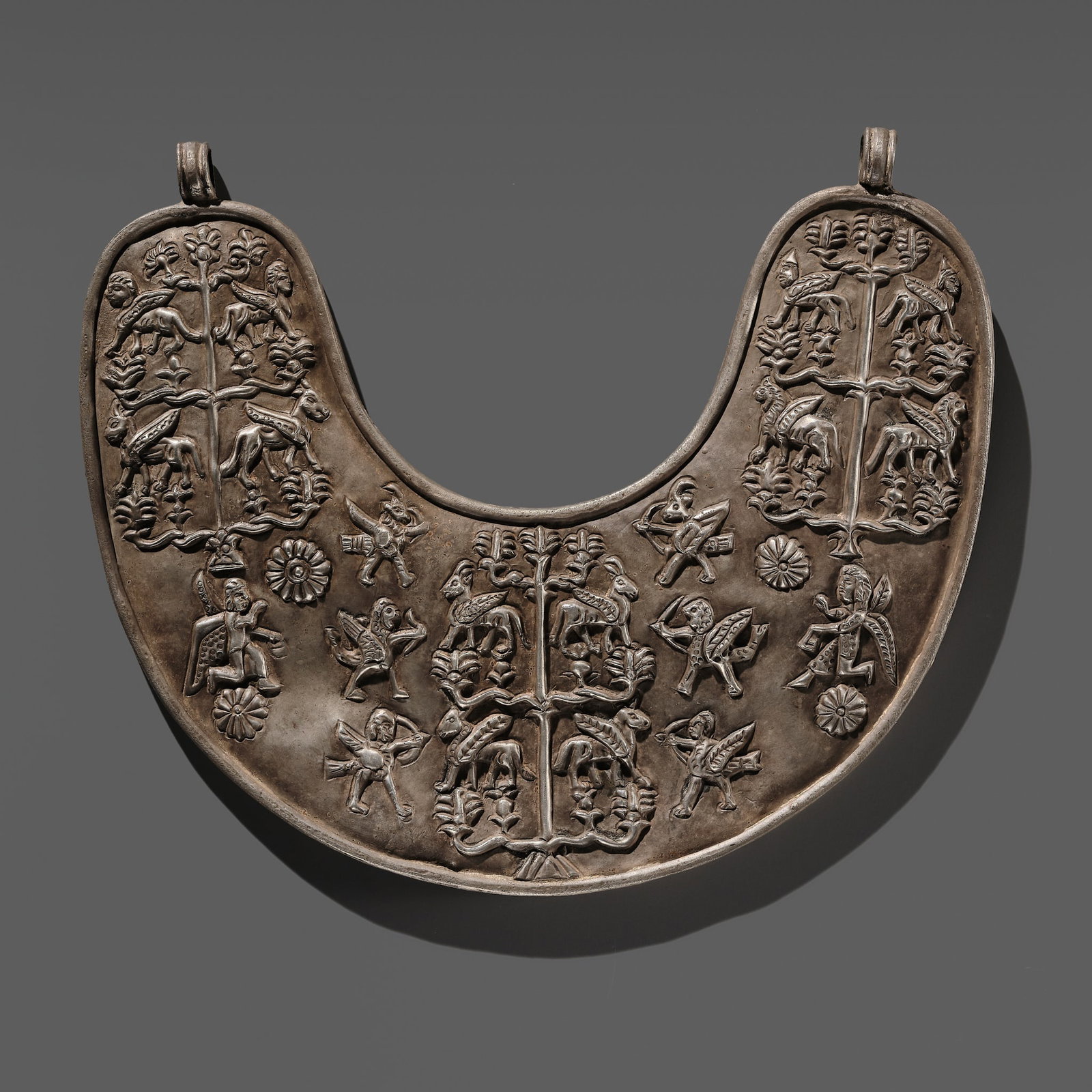 A RARE SILVER REPOUSSE 'TREE OF LIFE' PECTORAL, URARTIAN PERIOD, 8TH-7TH CENTURY BC (1 of 13)