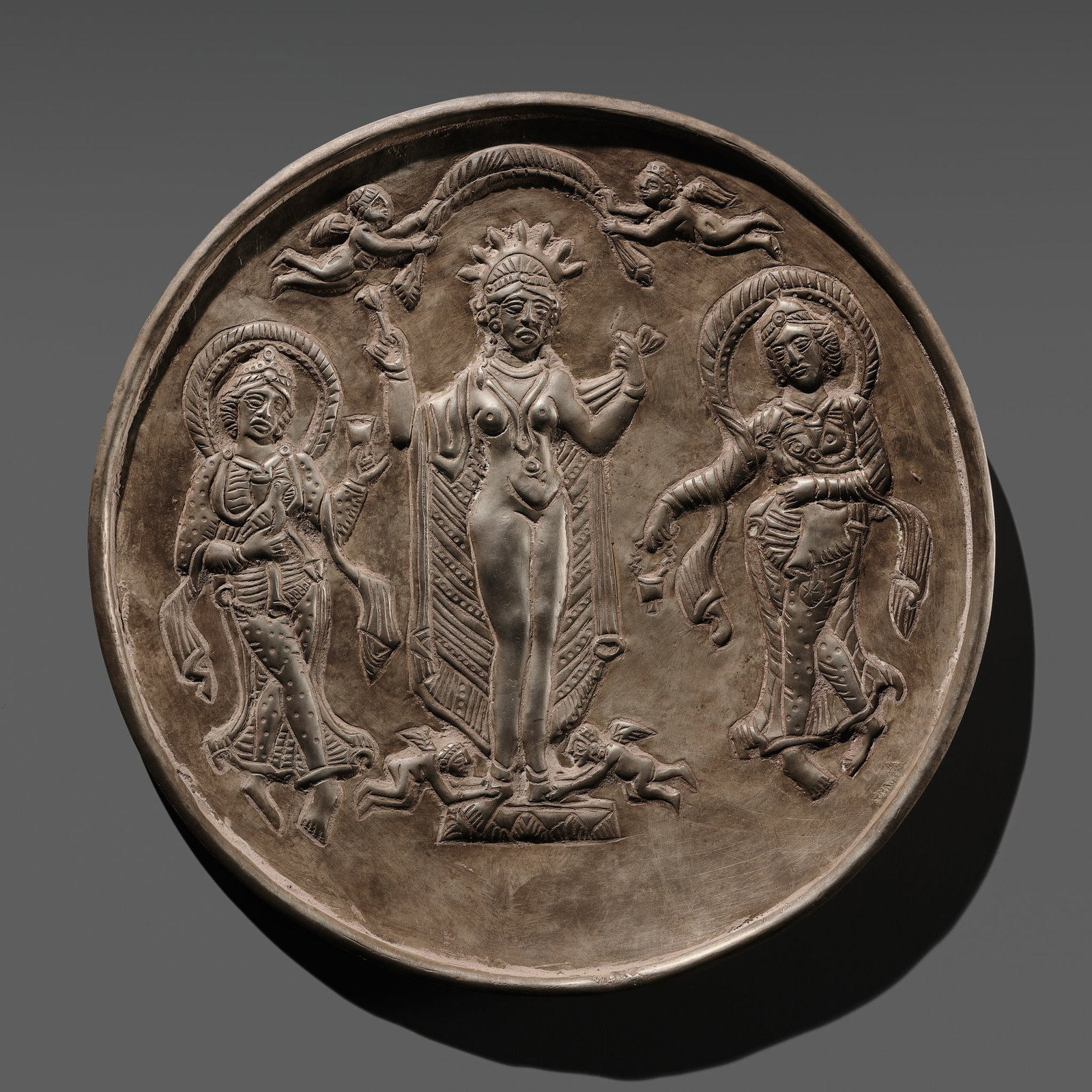 A RARE SILVER REPOUSSE 'APHRODITE-ASHI' PLAQUE, SASANIAN DYNASTY, 6TH CENTURY (1 of 11)
