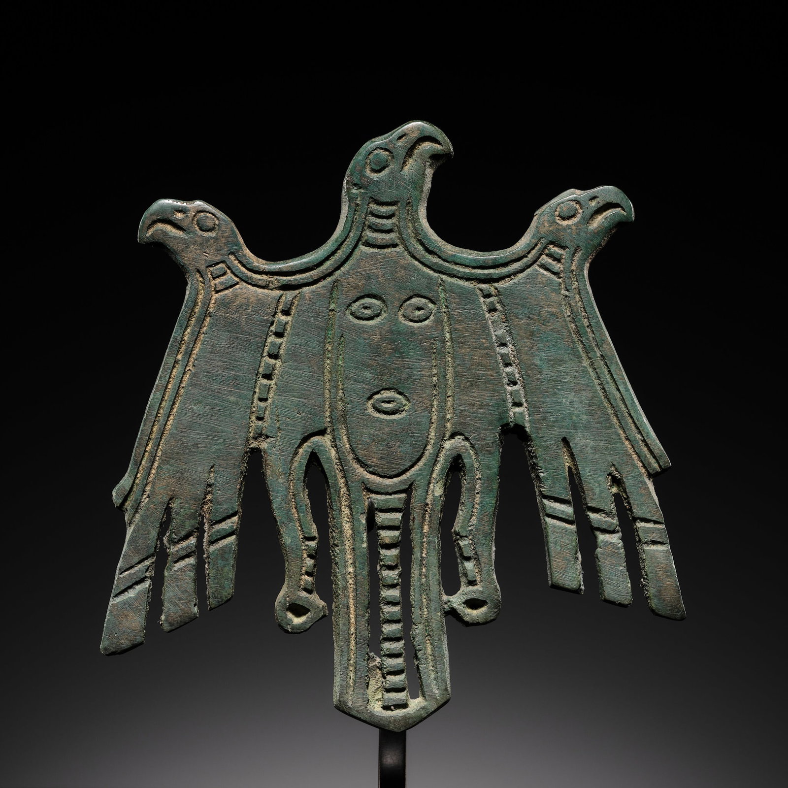 A BRONZE 'THREE-HEADED EAGLE' SHAMANISTIC PLAQUE, FINNO-UGRIC, PERM REGION, 10TH-11TH CENTURY (1 of 8)