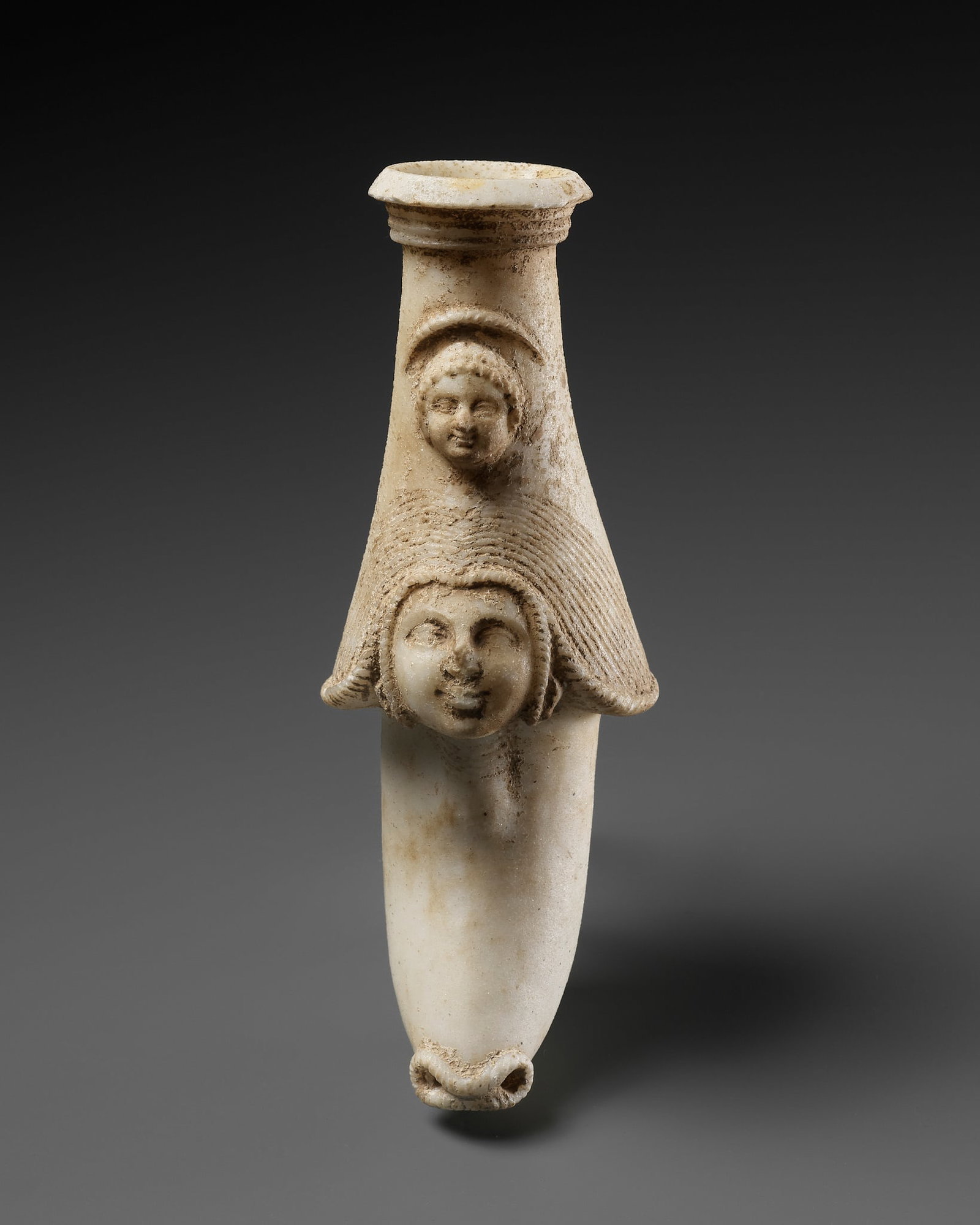 A WESTERN ASIATIC ALABASTER RHYTON WITH MOTHER GODDESS AND CHILD (1 of 12)