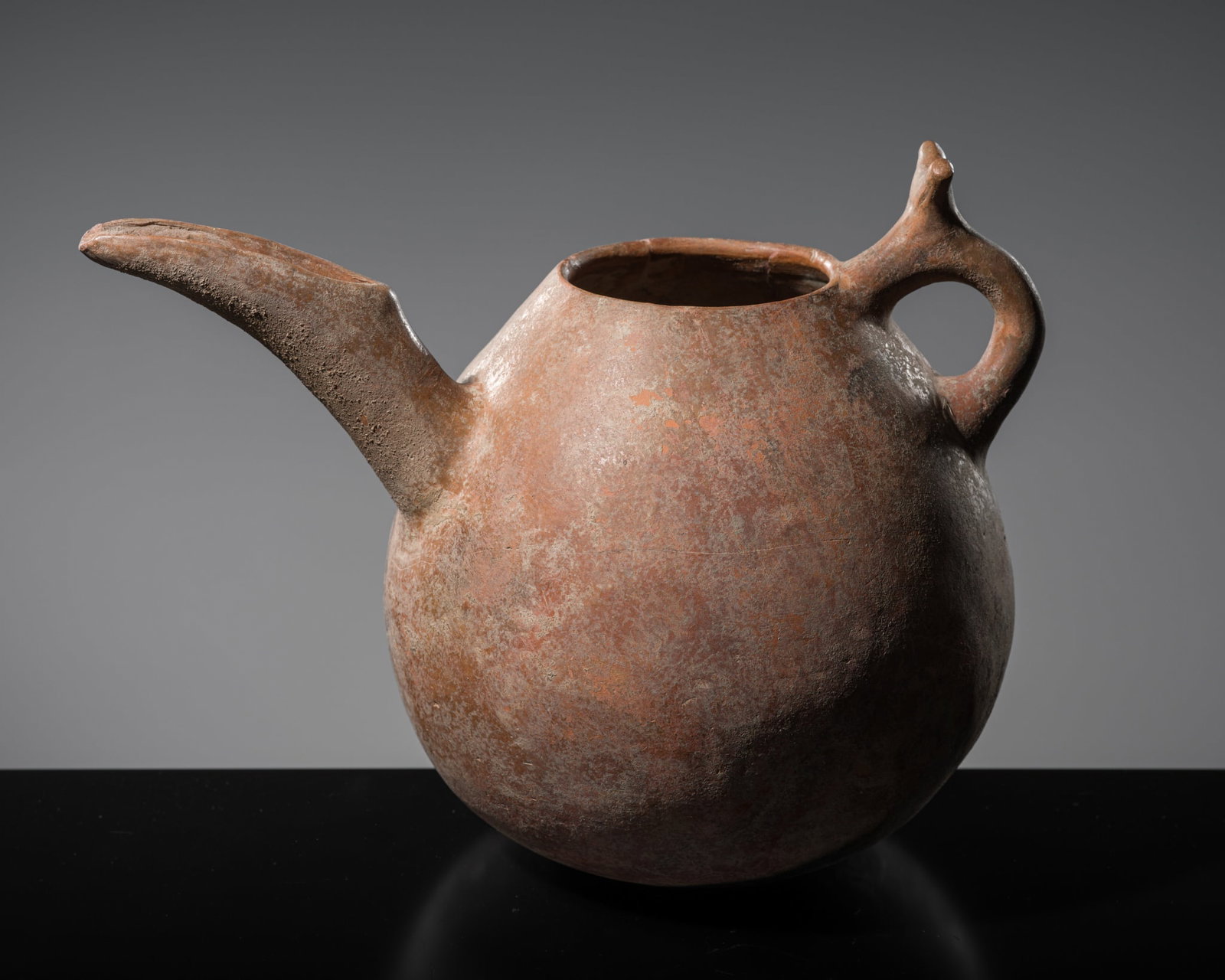 A TERRACOTTA BEAK-SPOUTED EWER, IRAN, 1500-1000 BC (1 of 16)