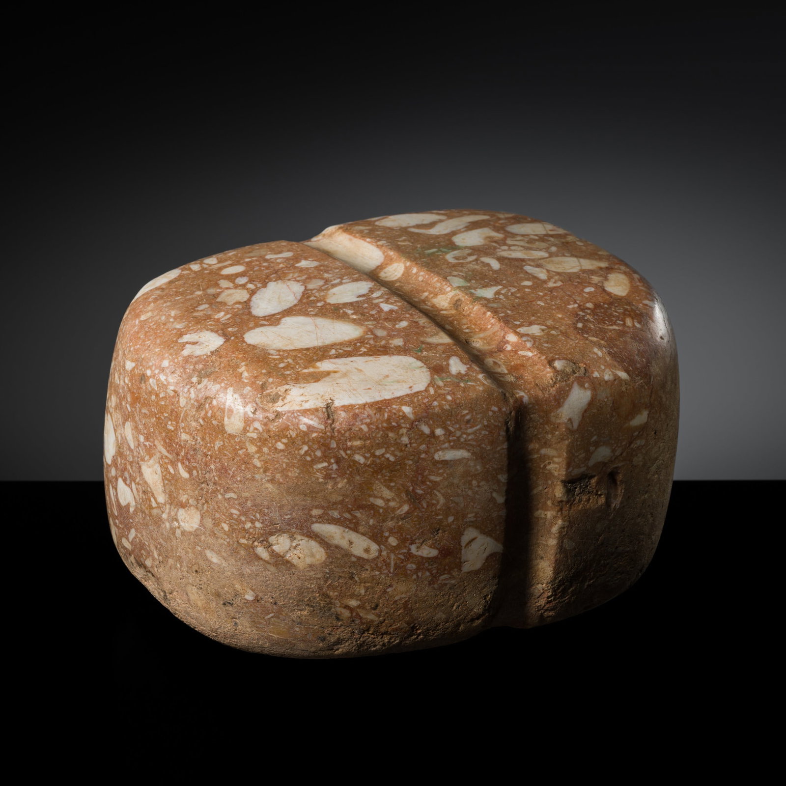 A BACTRIAN RED STONE RITUAL OBJECT, 3RD-2ND MILLENNIUM BC (1 of 12)