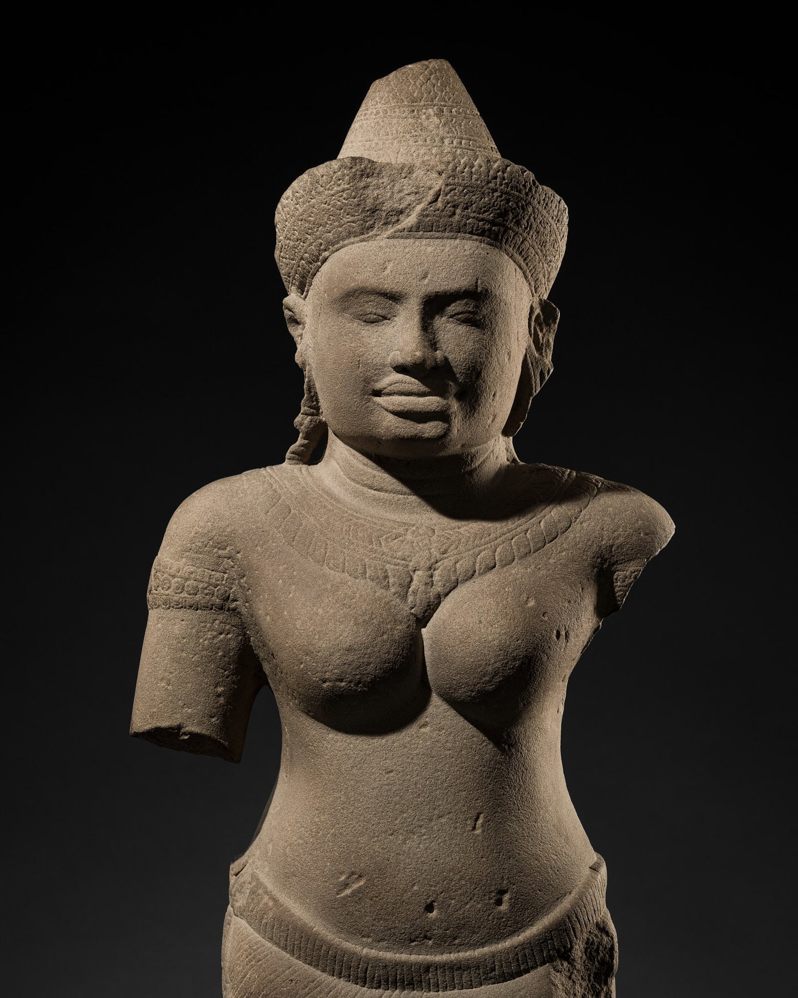 A LARGE SANDSTONE FIGURE OF UMA, ANGKOR WAT STYLE (1 of 15)