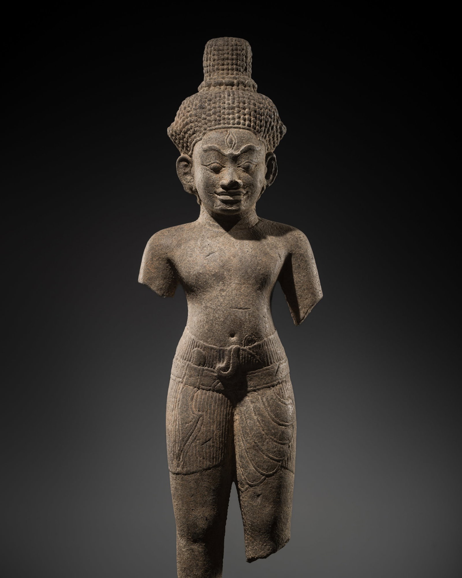 A RARE SANDSTONE FIGURE OF SHIVA, KHMER EMPIRE, 13TH-15TH CENTURY (1 of 17)