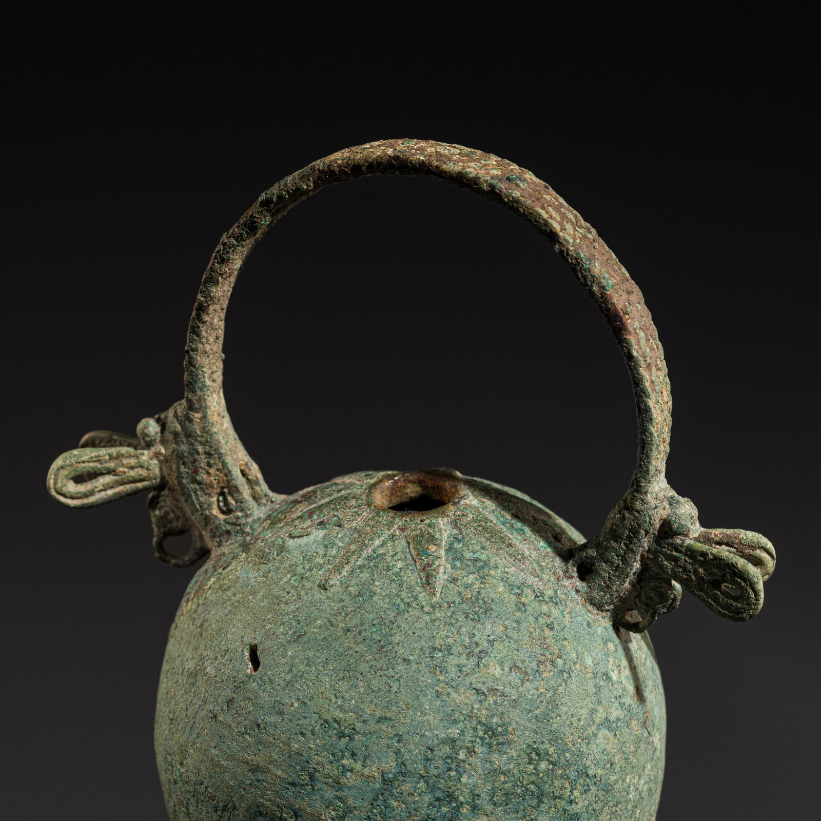 A BRONZE RITUAL BELL WITH A DRAGONFLY HANDLE, PERI-DONGSONIAN CULTURE, THAILAND, CIRCA 300 BC-200 AD (1 of 12)