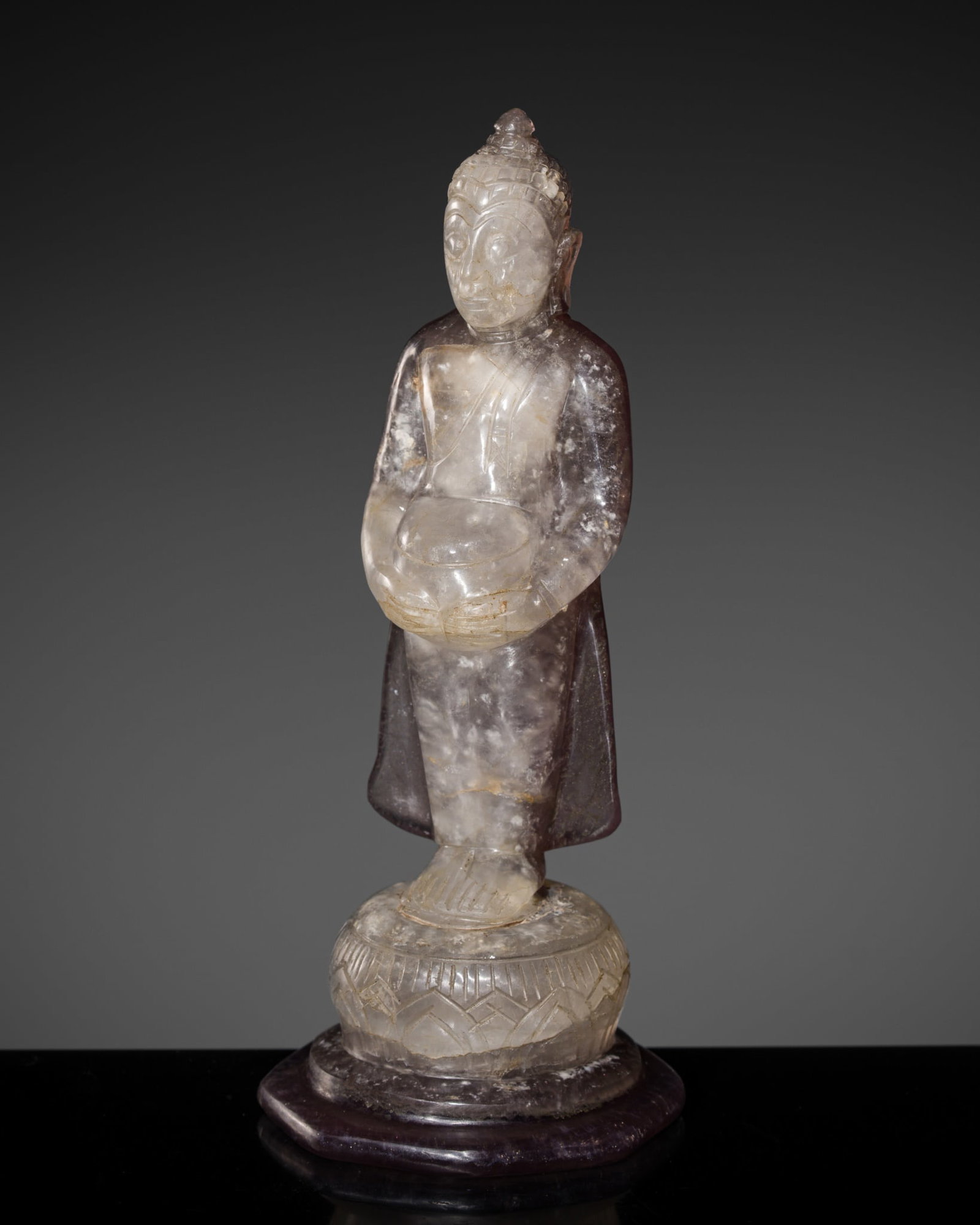 AN AMETHYST FIGURE OF BUDDHA, THAILAND, AYUTTHAYA, BEFORE 1763 AD (1 of 13)