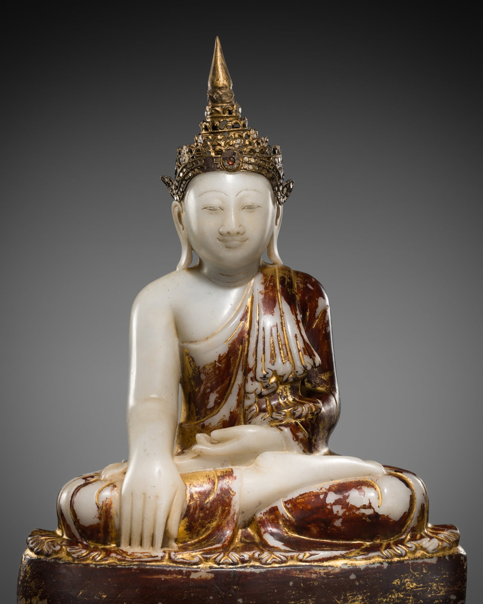 A RARE GILT AND PAINTED WHITE MARBLE FIGURE OF THE CROWNED BUDDHA, MANDALAY, 18TH-19TH CENTURY (1 of 11)