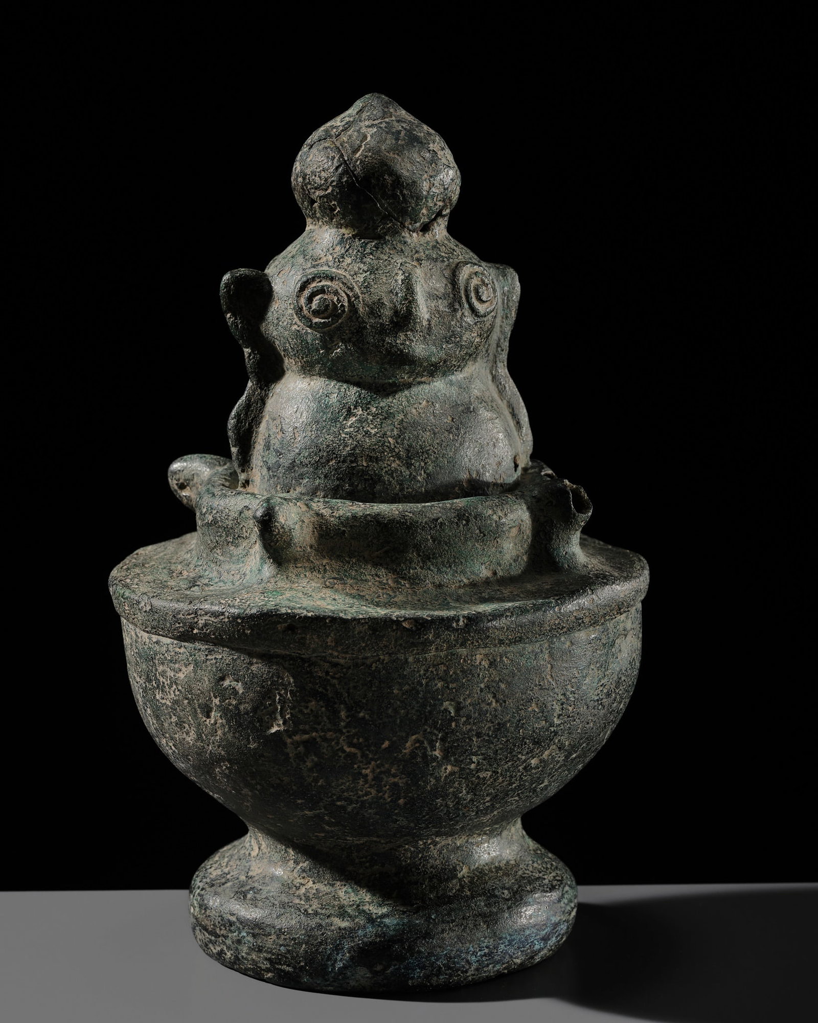 A BRONZE HUMANOID FIGURE, GOA MADE, EAST JAVA, INDONESIA, 1ST MILLENNIUM BC - 1ST MILLENNIUM AD: A BRONZE HUMANOID FIGURE, GOA MADE, EAST JAVA, INDONESIA, 1ST MILLENNIUM BC - 1ST MILLENNIUM AD Published: Claudio Giardino, Massimo Vidale, and Gian Luca Bonora (editors), Goa Made - An Archeological