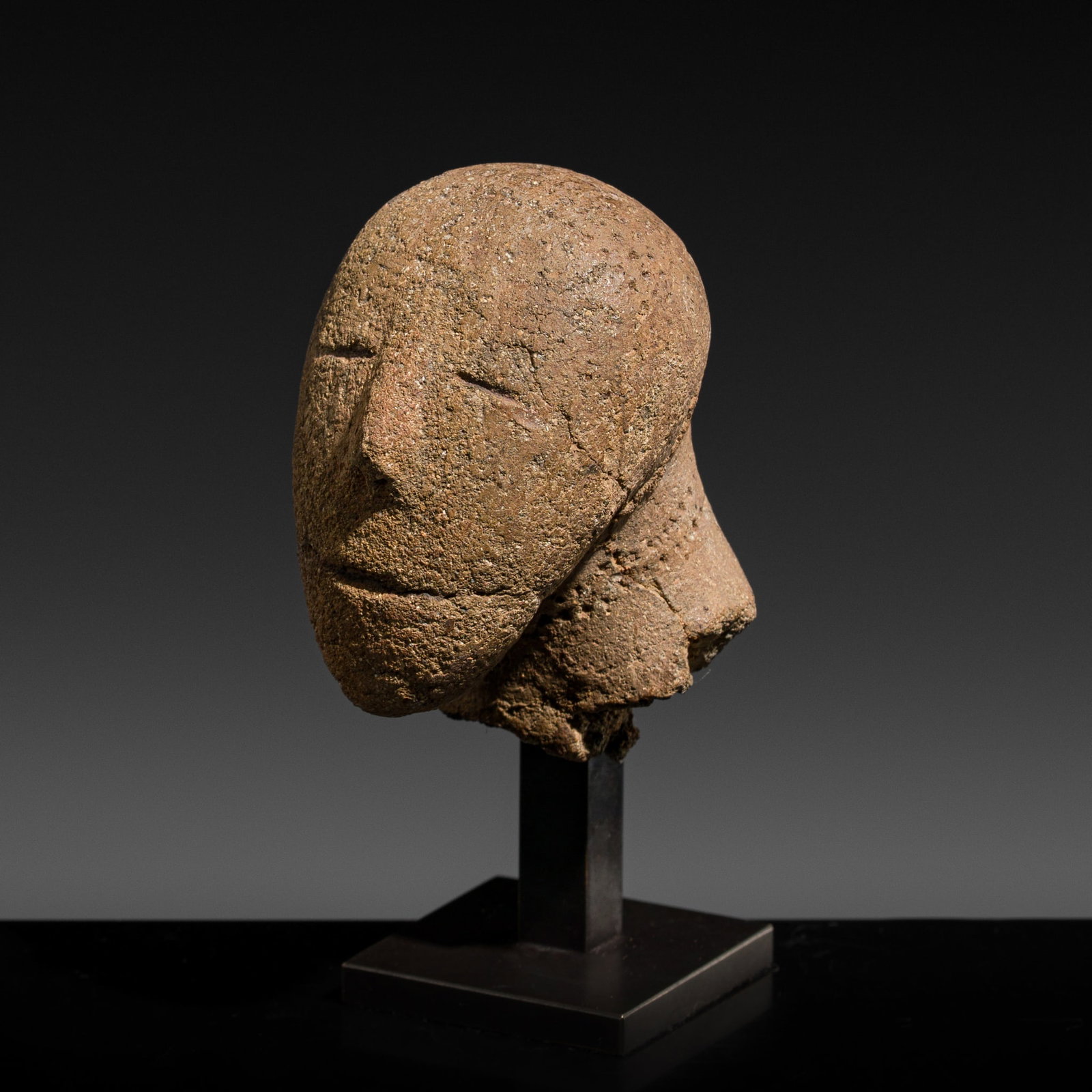 A RARE TERRACOTTA HEAD, CENTRAL SULAWESI, CIRCA MID-7TH CENTURY (1 of 12)