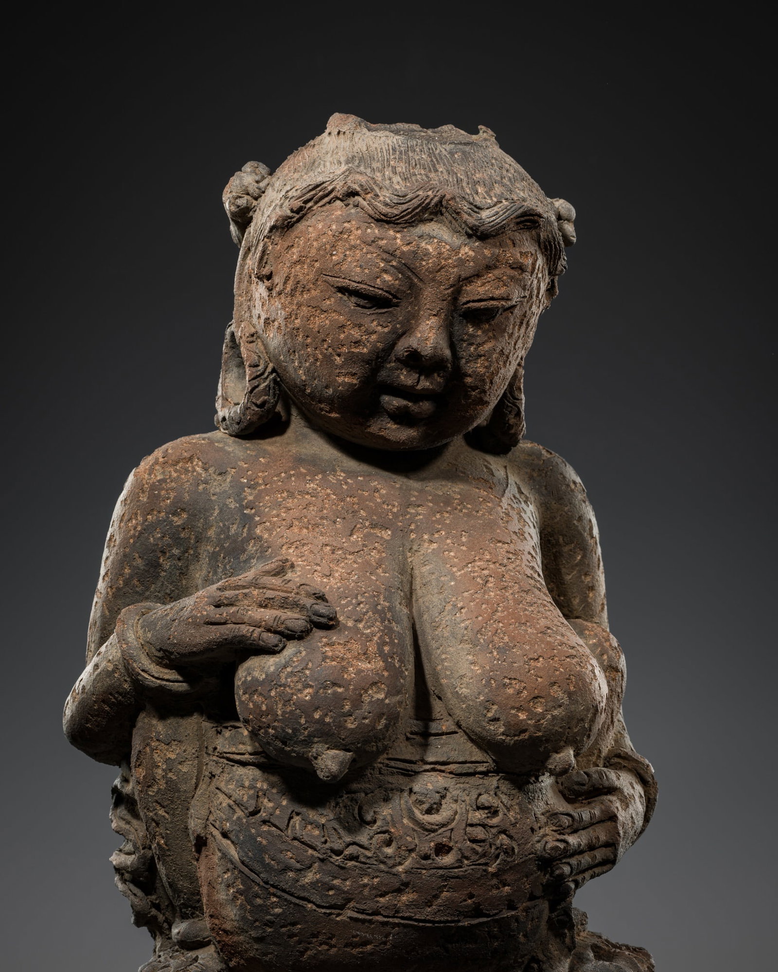 A MAJAPAHIT TERRACOTTA FIGURE OF A MOTHER GODDESS (1 of 12)