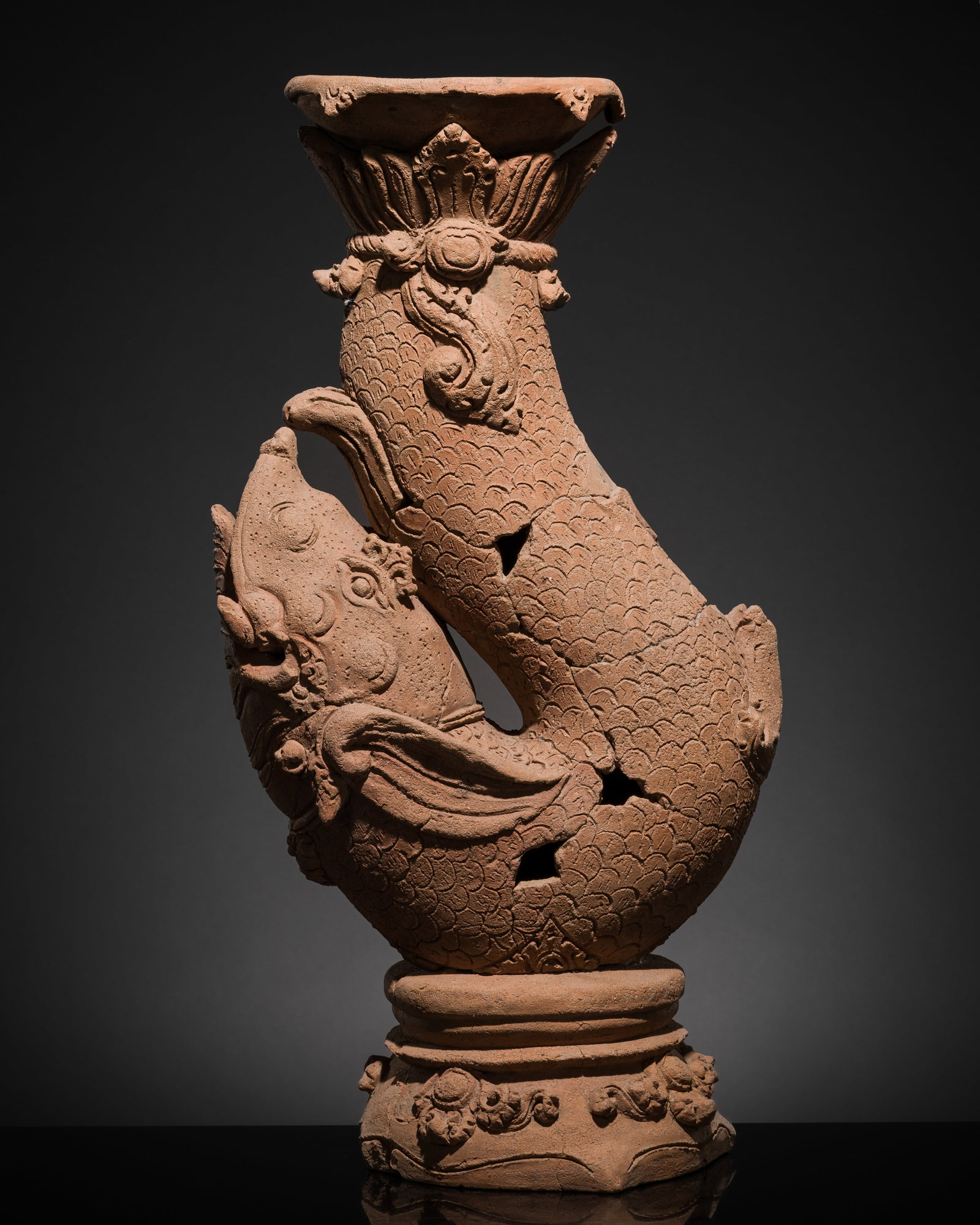 A MAJAPAHIT TERRACOTTA FIGURE OF A MAKARA (1 of 14)