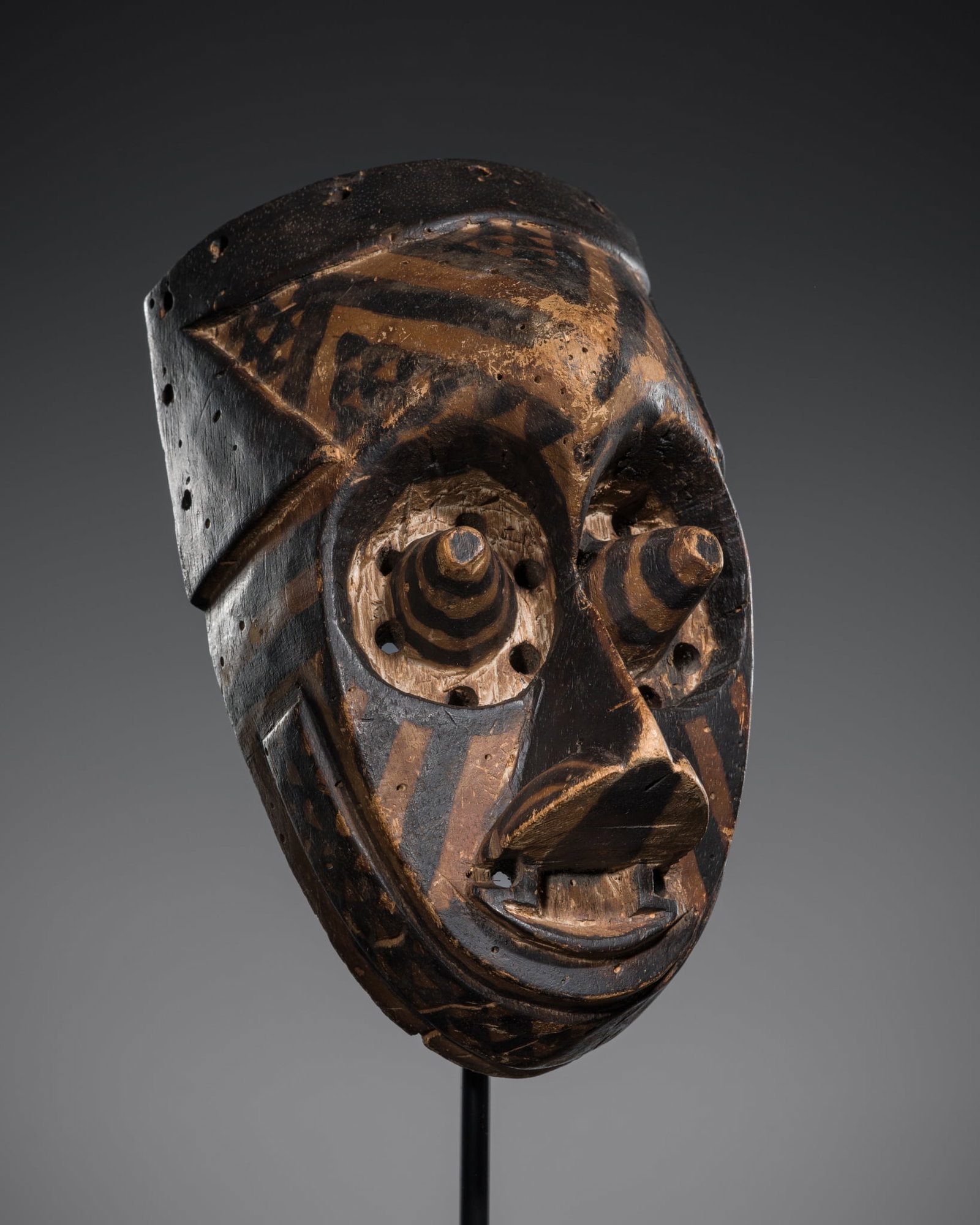 A KUBA POLYCHROME WOOD RITUAL DANCE MASK, PWOOM ITOK, FIRST HALF OF 20TH CENTURY (1 of 18)