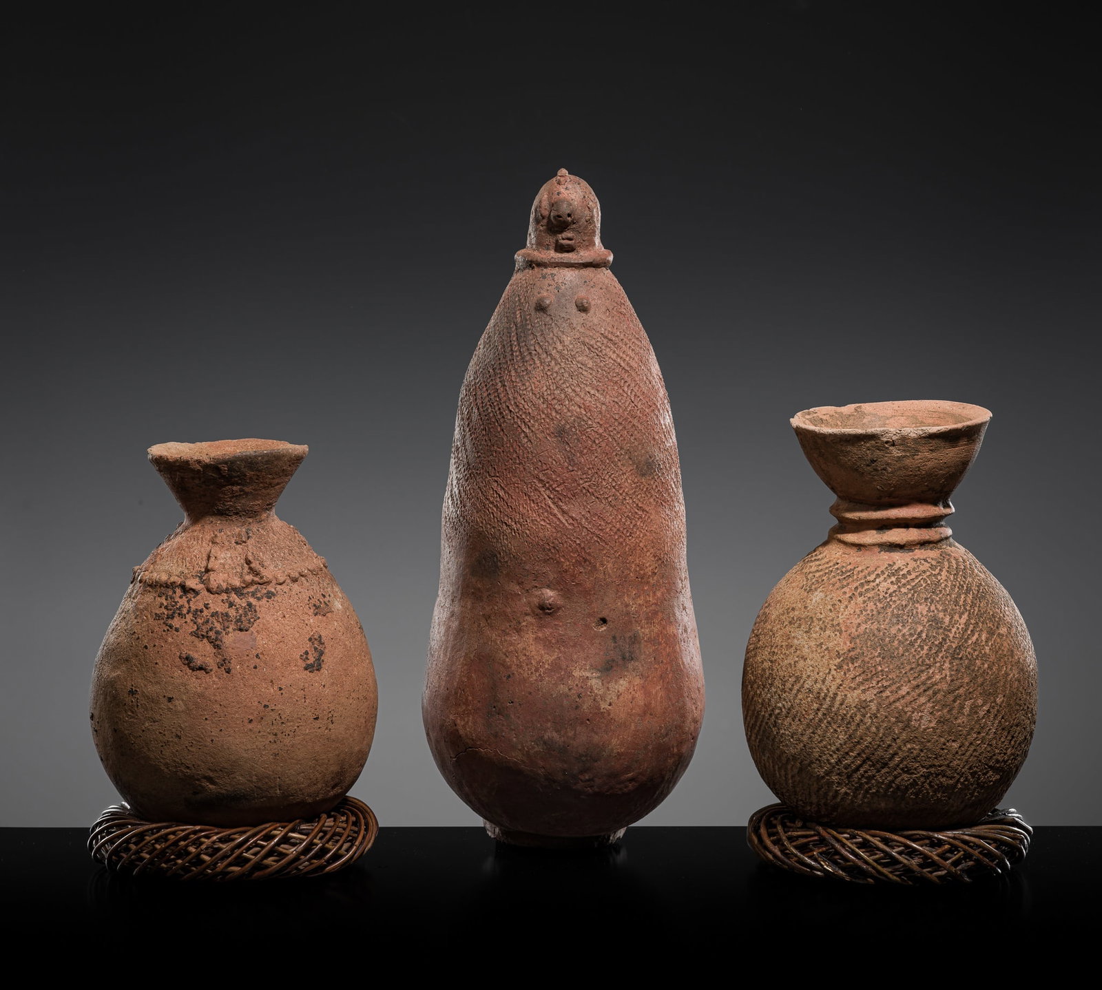 A GROUP OF TWO TERRACOTTA FUNERARY VESSELS AND A HUMAN FIGURE, PROBABLY BURA CULTURE (1 of 16)
