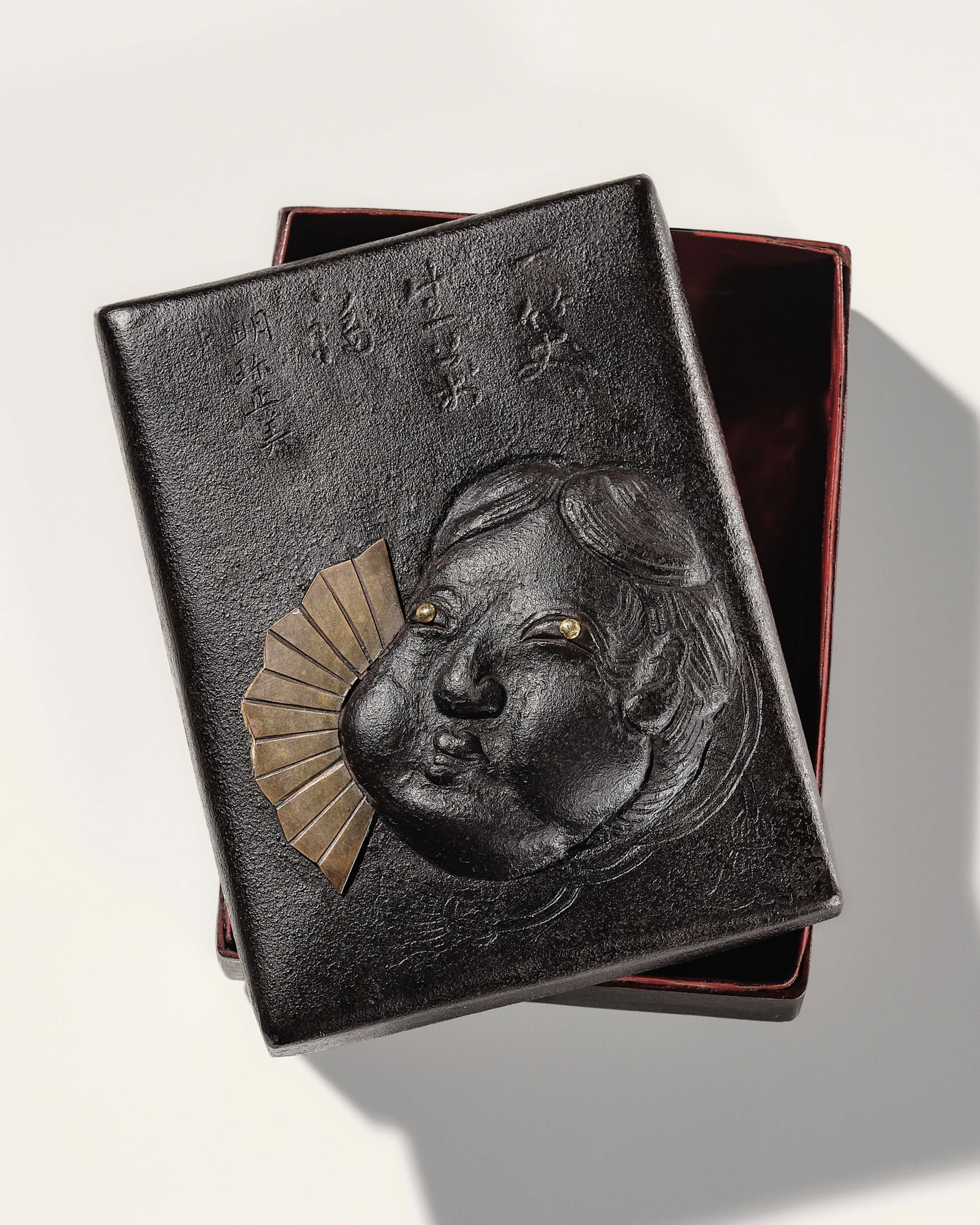 MYOCHIN MASAYOSHI: A SMALL HAMMERED IRON ‘OKAME’ BOX AND COVER: MYOCHIN MASAYOSHI: A SMALL HAMMERED IRON ‘OKAME’ BOX AND COVER By Myochin Masayoshi, signed Myochin Masayoshi Japan, late 19th-early 20th century, Meiji period (1868-1912) Finel