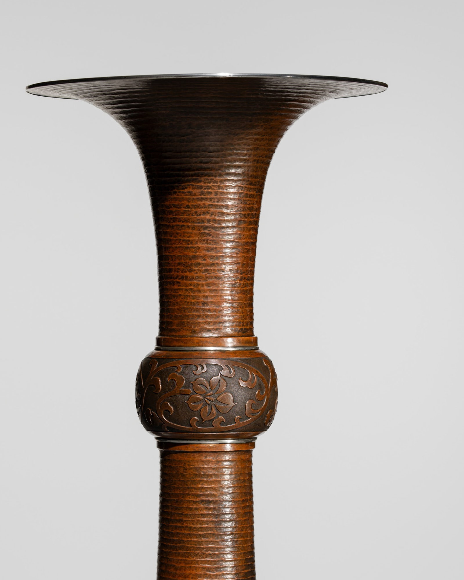 KAWAKAMI EIZAN: A FINE RED-PATINATED BRONZE AND SILVER ARCHAISTIC GU-STYLE VASE: KAWAKAMI EIZAN: A FINE RED-PATINATED BRONZE AND SILVER ARCHAISTIC GU-STYLE VASE By Kawakami Eizan, sealed Eizan Japan, 20th century, Taisho (1912-1926) to Showa era (1926-1989) Finely cast and worked