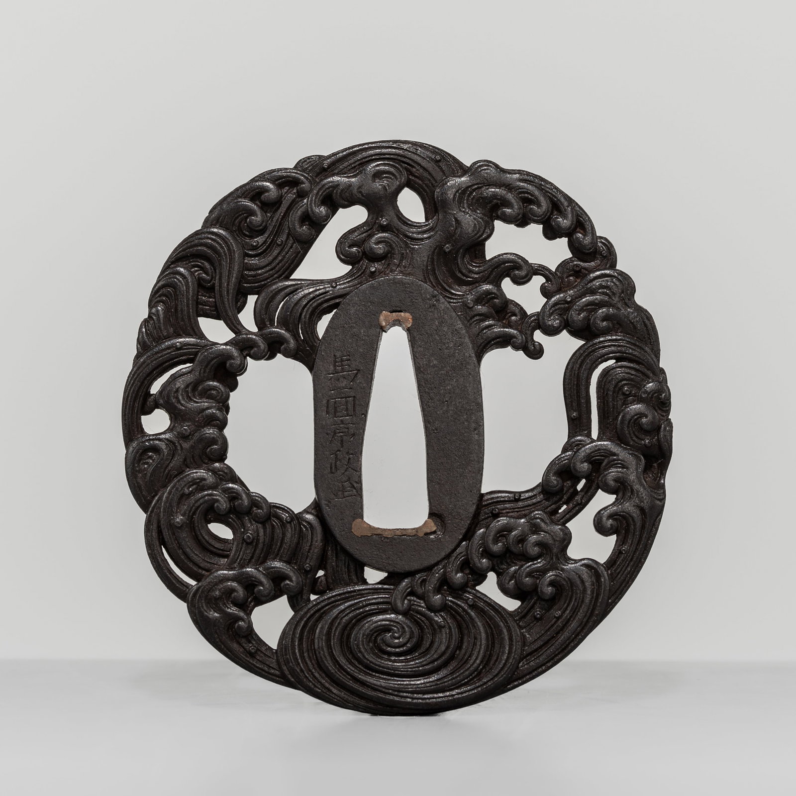 TSUNEMASA AND YASUYUKI: AN IRON TSUBA WITH BILLOWING WAVES, WITH A NBTHK HOZON CERTIFICATE (1 of 15)