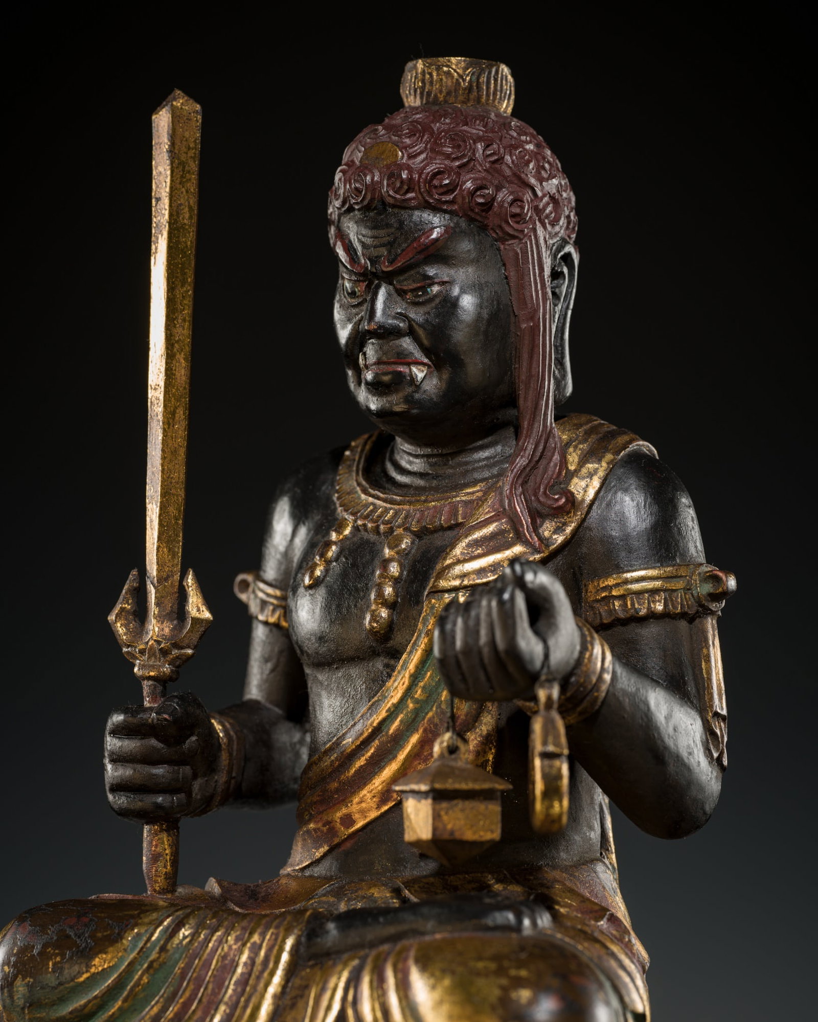A GILT AND POLYCHROME WOOD FIGURE OF FUDO MYO-O (ACALA), LATE MUROMACHI-EARLY EDO PERIOD: A GILT AND POLYCHROME WOOD FIGURE OF FUDO MYO-O (ACALA), LATE MUROMACHI-EARLY EDO PERIOD Japan, 16th-17th century, late Muromachi (1333-1573) to early Edo period (1615-1868) Finely carved and ri