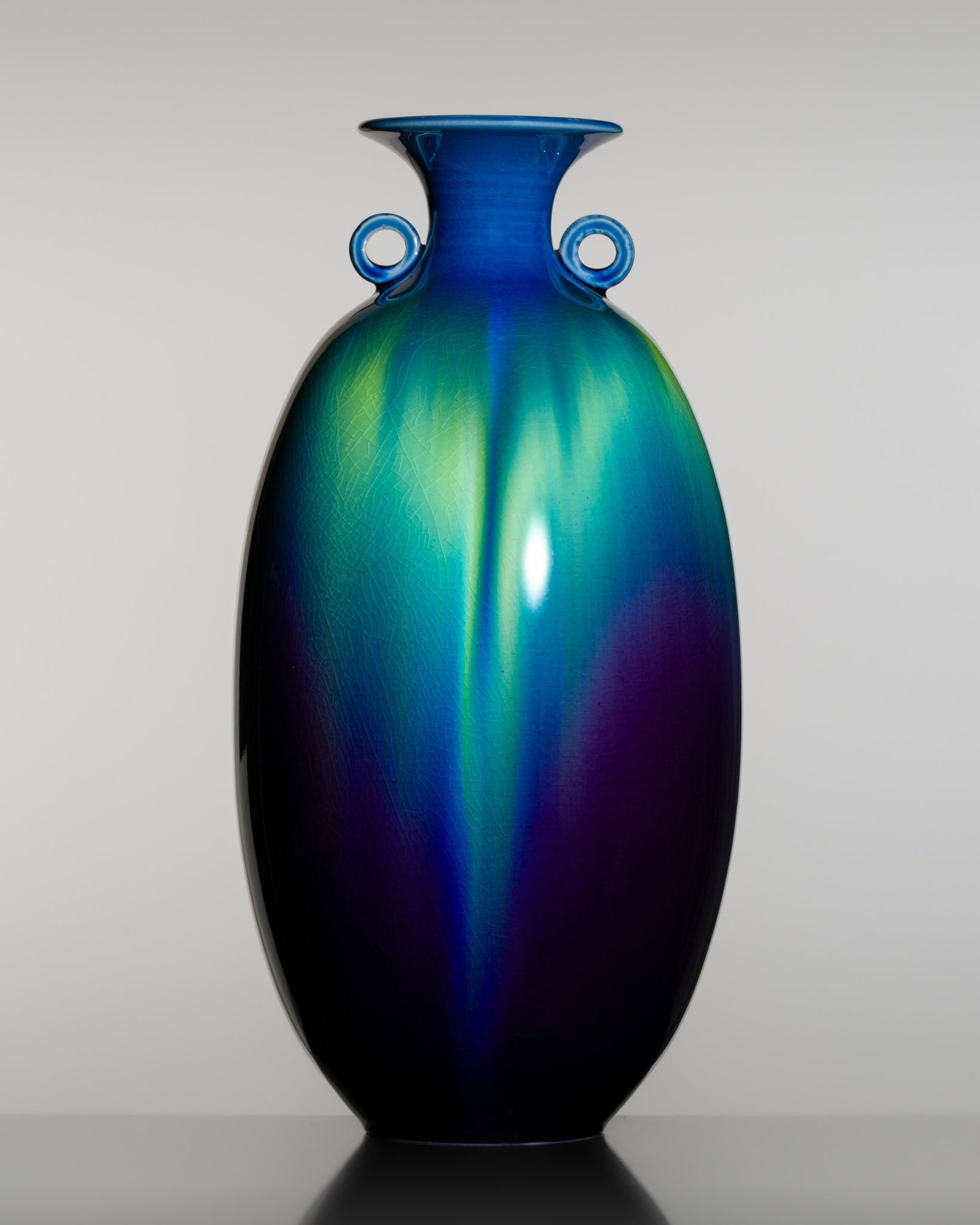 TOKUDA YASOKICHI III (LIVING NATIONAL TREASURE): A KUTANI GLAZED PORCELAIN ‘EARS’ VASE: TOKUDA YASOKICHI III (LIVING NATIONAL TREASURE): A KUTANI GLAZED PORCELAIN ‘EARS’ VASE By Tokuda Yasokichi III (1933-2009), signed Kutani Masahiko Japan, Heisei period (1989-2019) The oliv