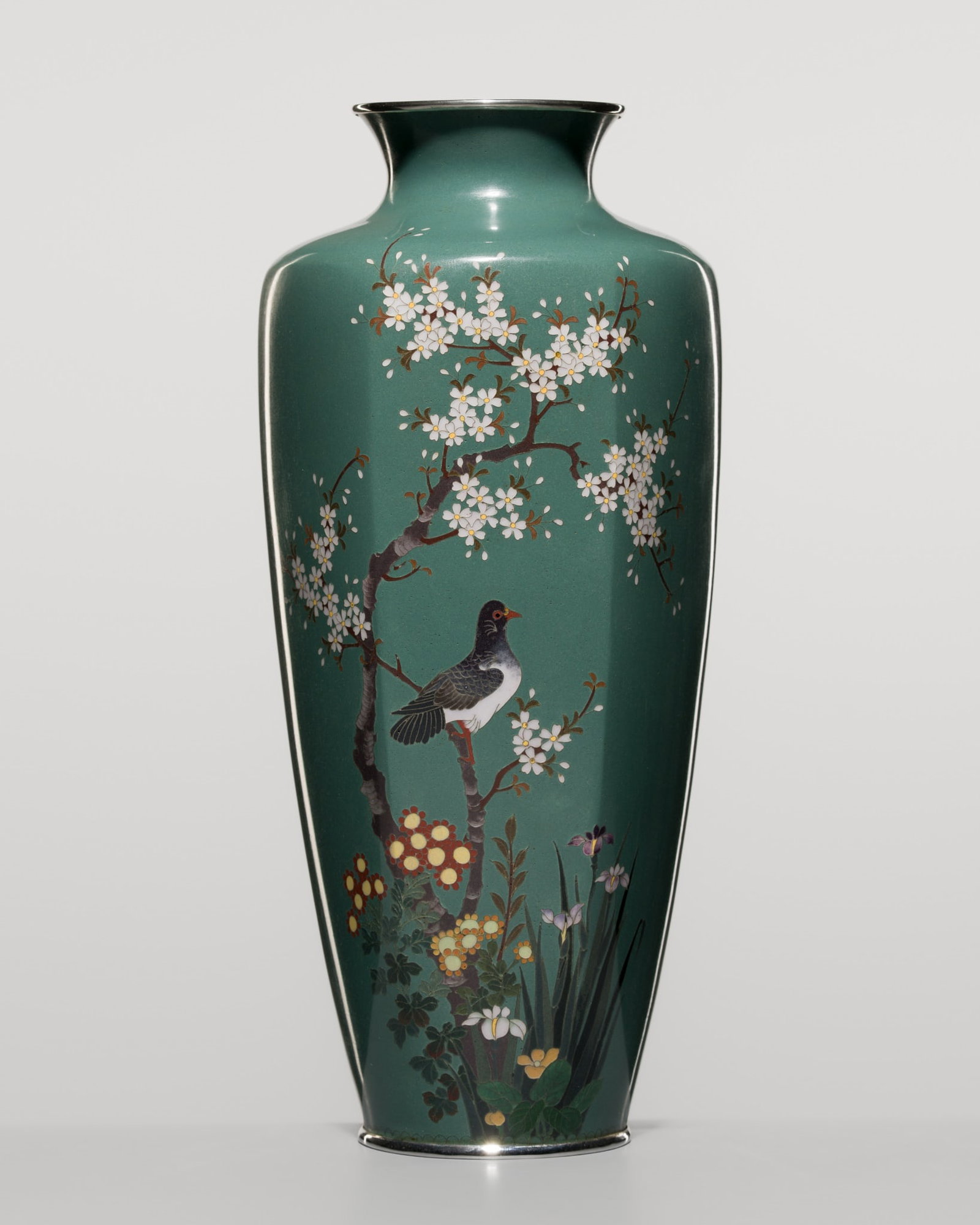 A TURQUOISE-GREEN CLOISONNÉ ENAMEL ‘DOVE AMID CHERRY BLOSSOMS’ FACETED BALUSTER: A TURQUOISE-GREEN CLOISONNÉ ENAMEL ‘DOVE AMID CHERRY BLOSSOMS’ FACETED BALUSTER VASE Japan, Meiji period (1868-1912) The slender, hexagonal-faceted body gently tapering toward a flat 