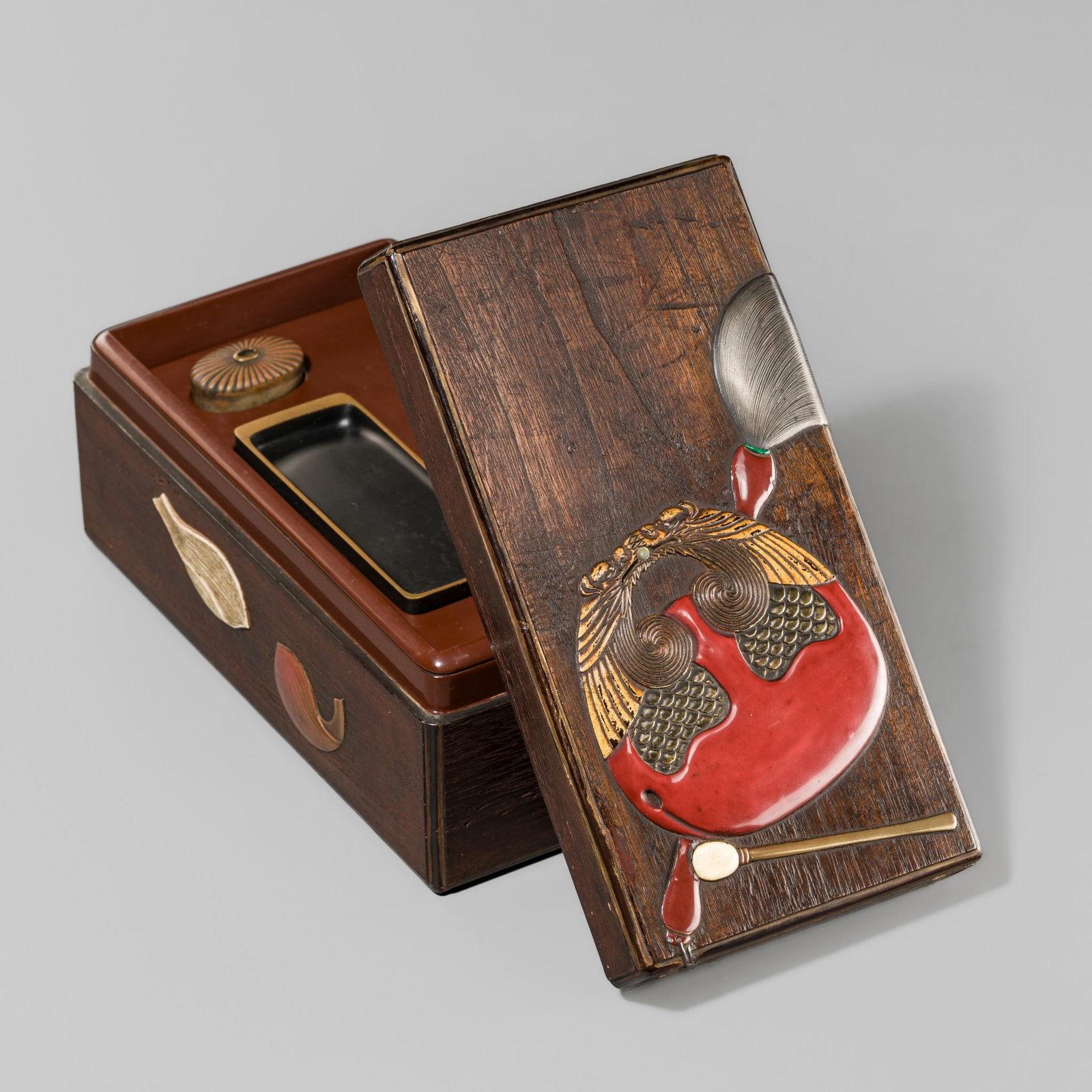 KAN: AN INLAID AND LACQUERED WOOD ‘BUDDHIST ACCOUTREMENTS’ SUZURIBAKO (WRITING BOX) WITH (1 of 18)