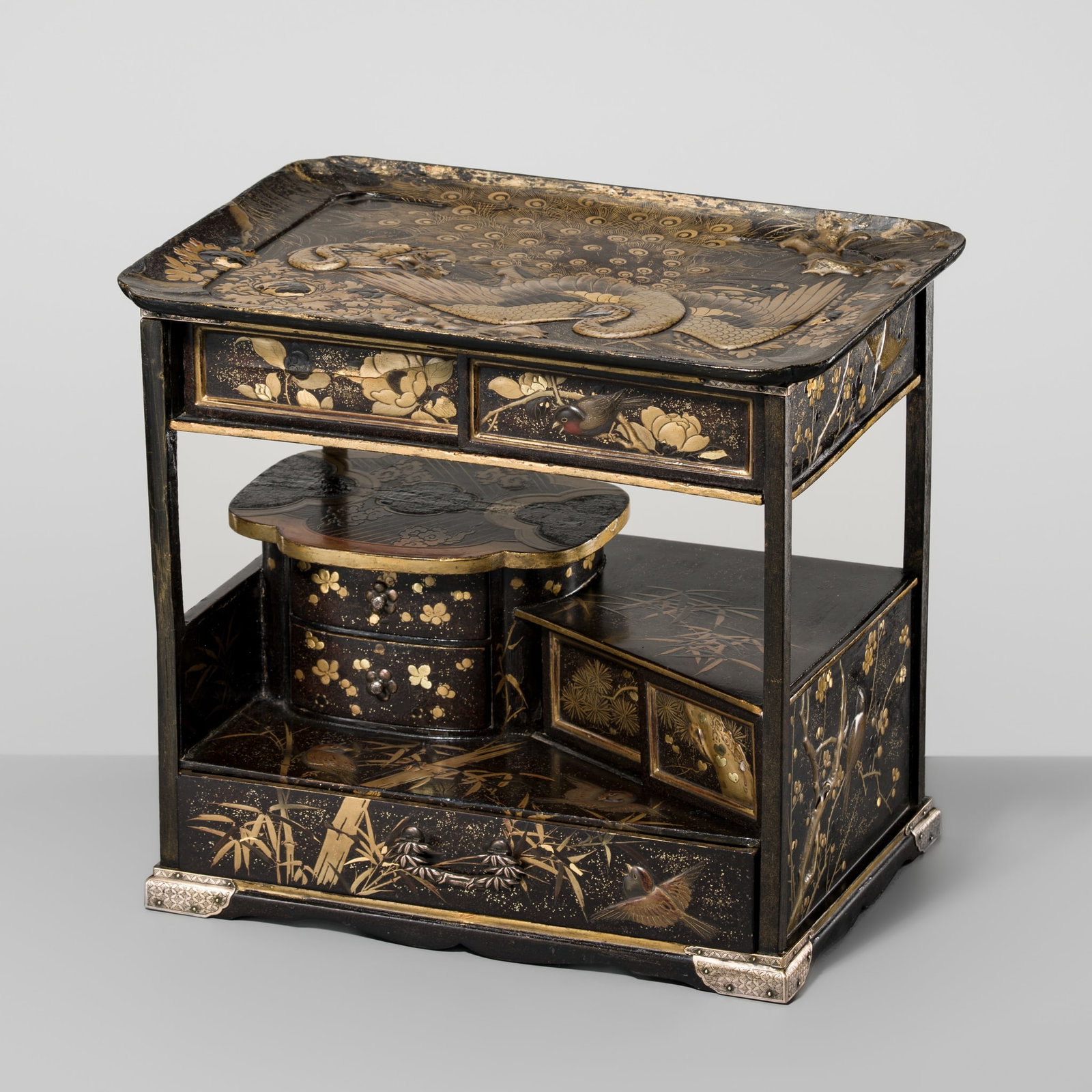 A FINE BLACK AND GOLD LACQUER ‘PEACOCK AND SPARROWS’ SHODANA (SMALL DISPLAY CABINET): A FINE BLACK AND GOLD LACQUER ‘PEACOCK AND SPARROWS’ SHODANA (SMALL DISPLAY CABINET) Japan, 19th century, Edo period (1615-1868) Finely constructed, the cabinet raised on short lobed feet 