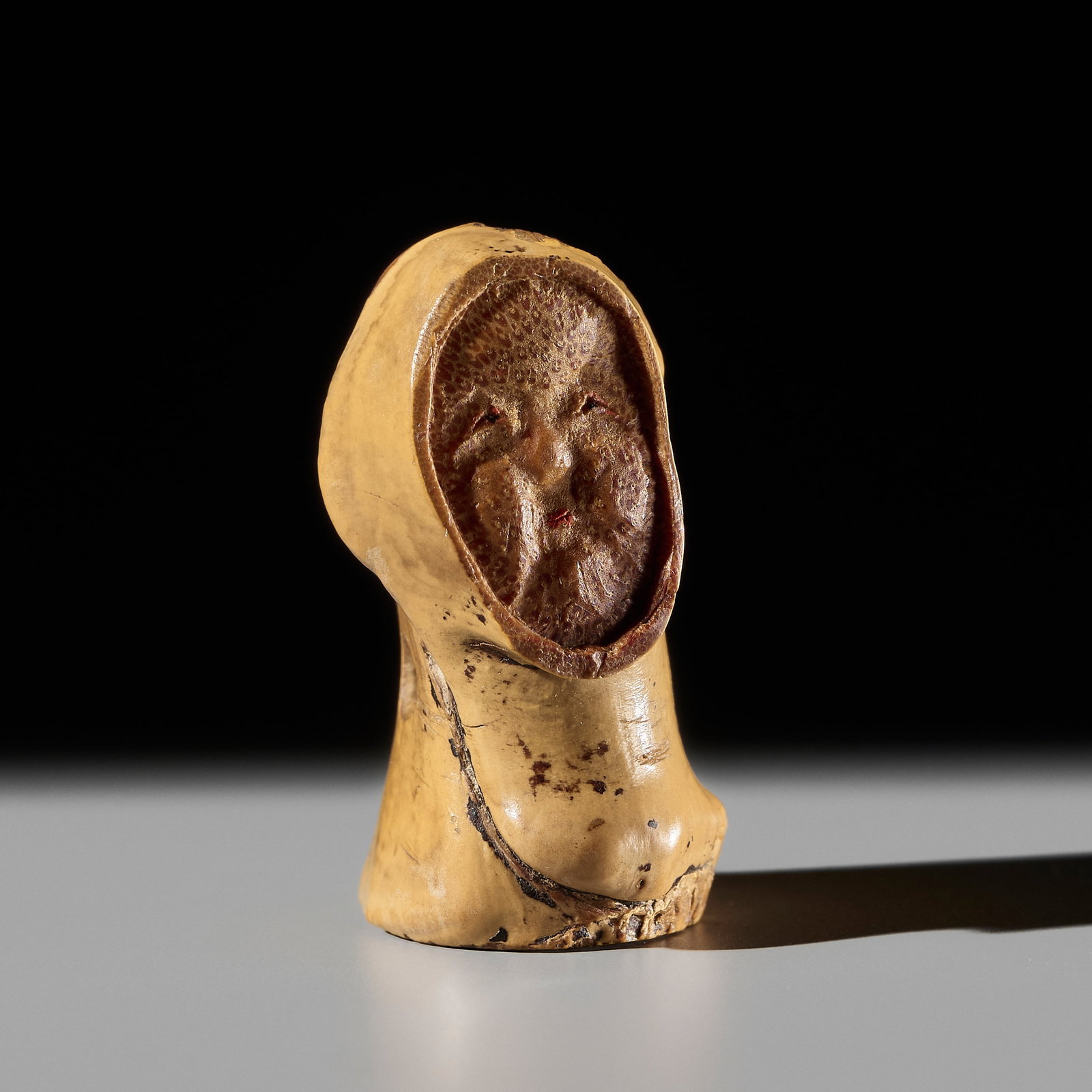 AN UNUSUAL AND EXQUISITE BAMBOO NETSUKE OF A HOODED LADY (1 of 10)