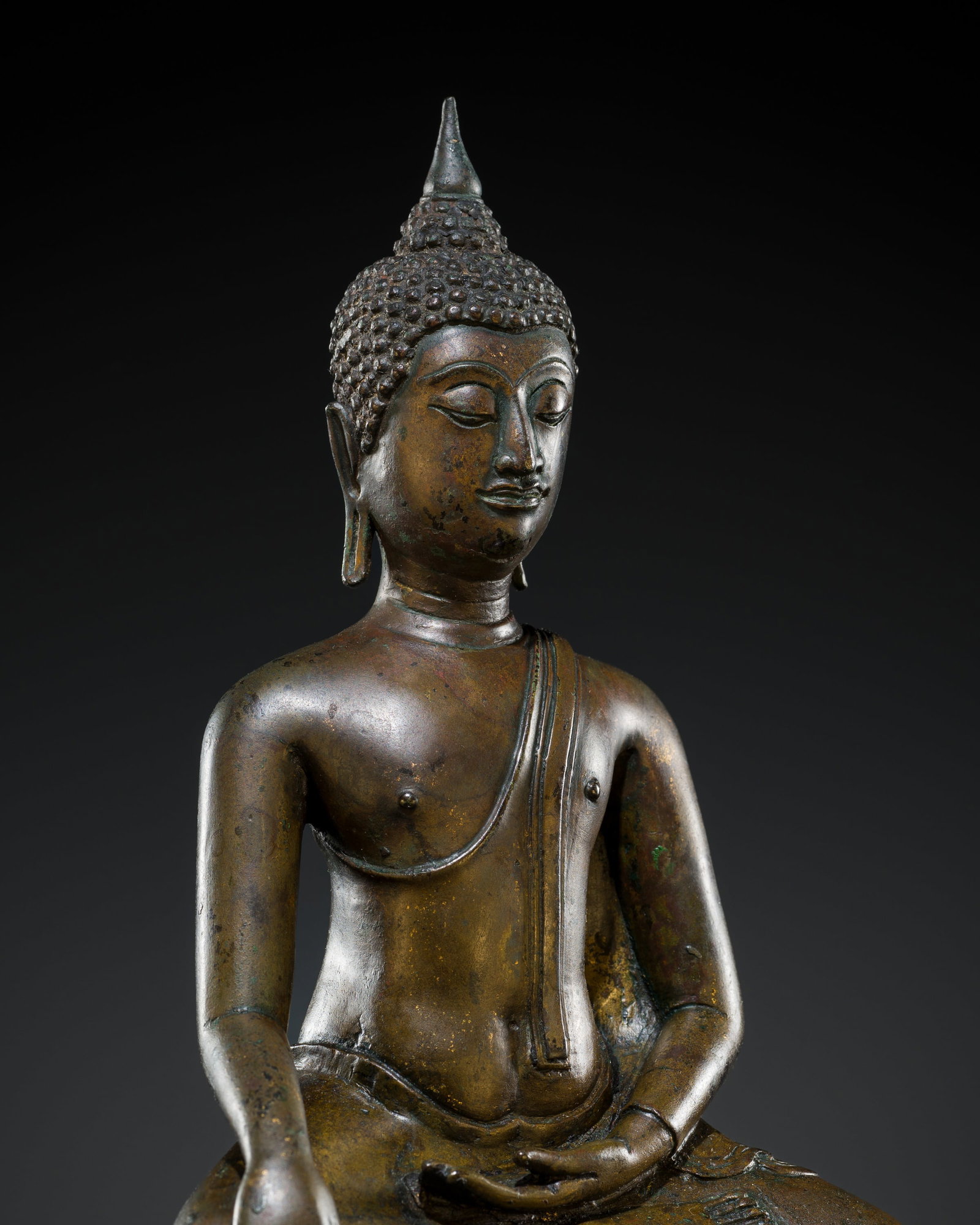 A FINE BRONZE FIGURE OF BUDDHA MARAVIJAYA, SUKHOTHAI PERIOD, KAMPHAENG PHET STYLE, 15TH CENTURY: A FINE BRONZE FIGURE OF BUDDHA MARAVIJAYA, SUKHOTHAI PERIOD, KAMPHAENG PHET STYLE, 15TH CENTURY This lot is from a single owner collection and is therefore offered without reserve The Jorgen Ruben Gal