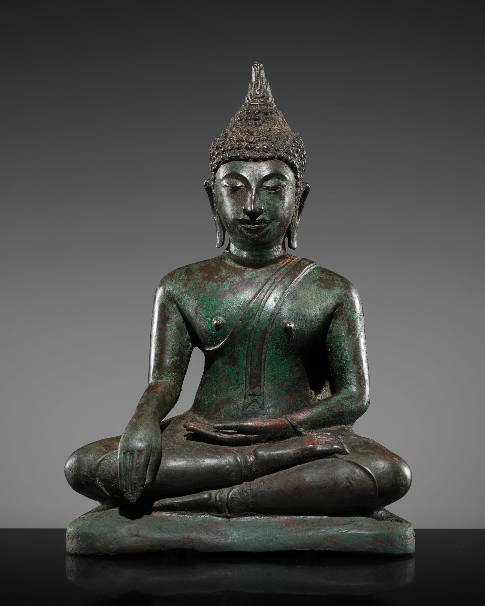 A BRONZE FIGURE OF BUDDHA SHAKYAMUNI, NORTHERN SUKHOTHAI STYLE, 15TH CENTURY (1 of 18)