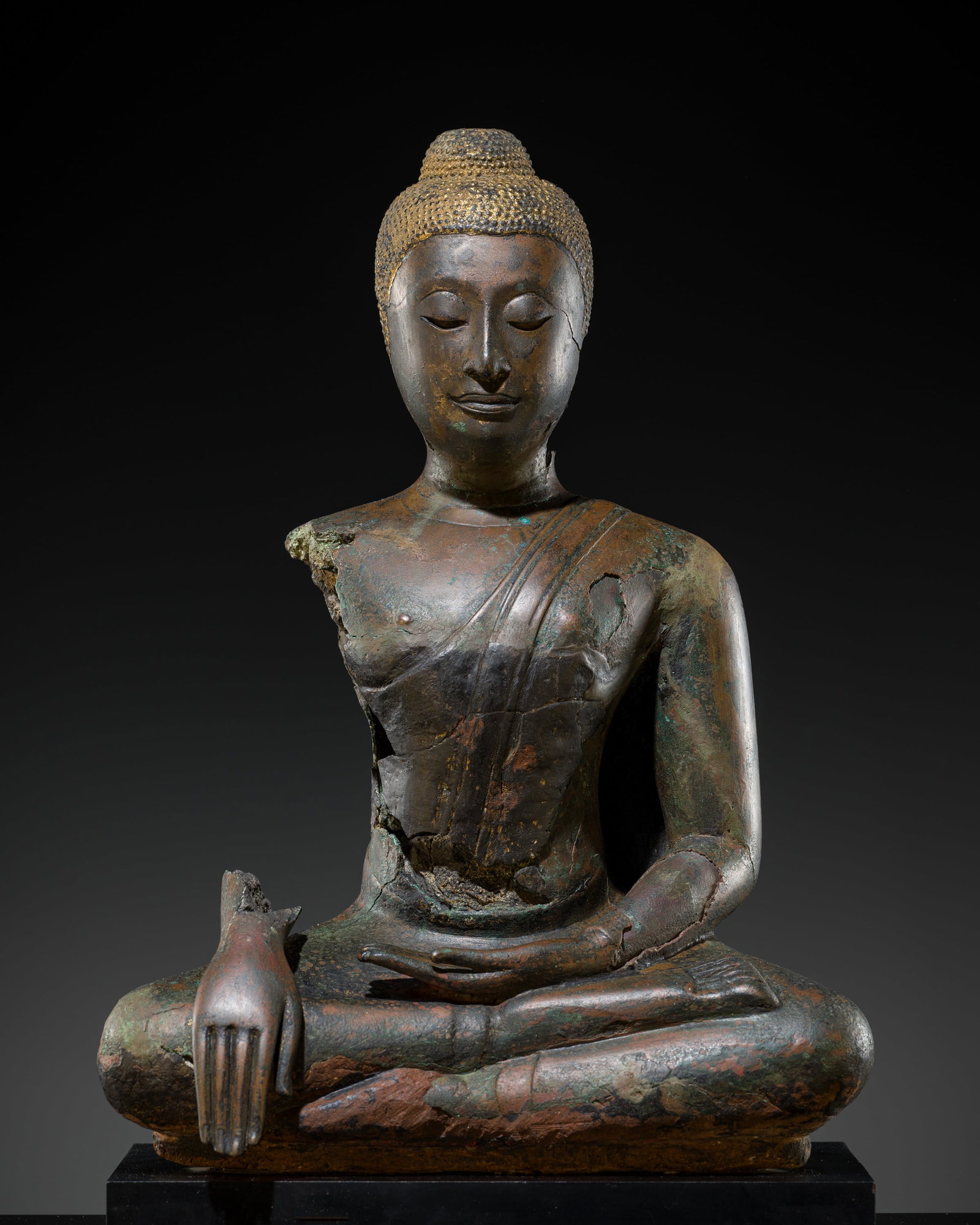 A BRONZE FIGURE OF BUDDHA, AYUTTHAYA PERIOD, 15TH-16TH CENTURY: A BRONZE FIGURE OF BUDDHA, AYUTTHAYA PERIOD, 15TH-16TH CENTURY This lot is from a single owner collection and is therefore offered without reserve The Jorgen Ruben Gallery Ledger, entry from 2005: 