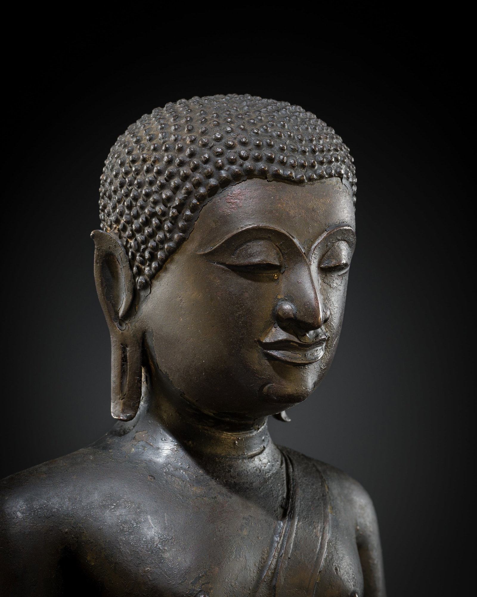 A BRONZE BUST OF A DISCIPLE, CHIENG SEN PERIOD, 15TH-16TH CENTURY: A BRONZE BUST OF A DISCIPLE, CHIENG SEN PERIOD, 15TH-16TH CENTURY This lot is from a single owner collection and is therefore offered without reserve The Jorgen Ruben Gallery Ledger, entry from 2012: 