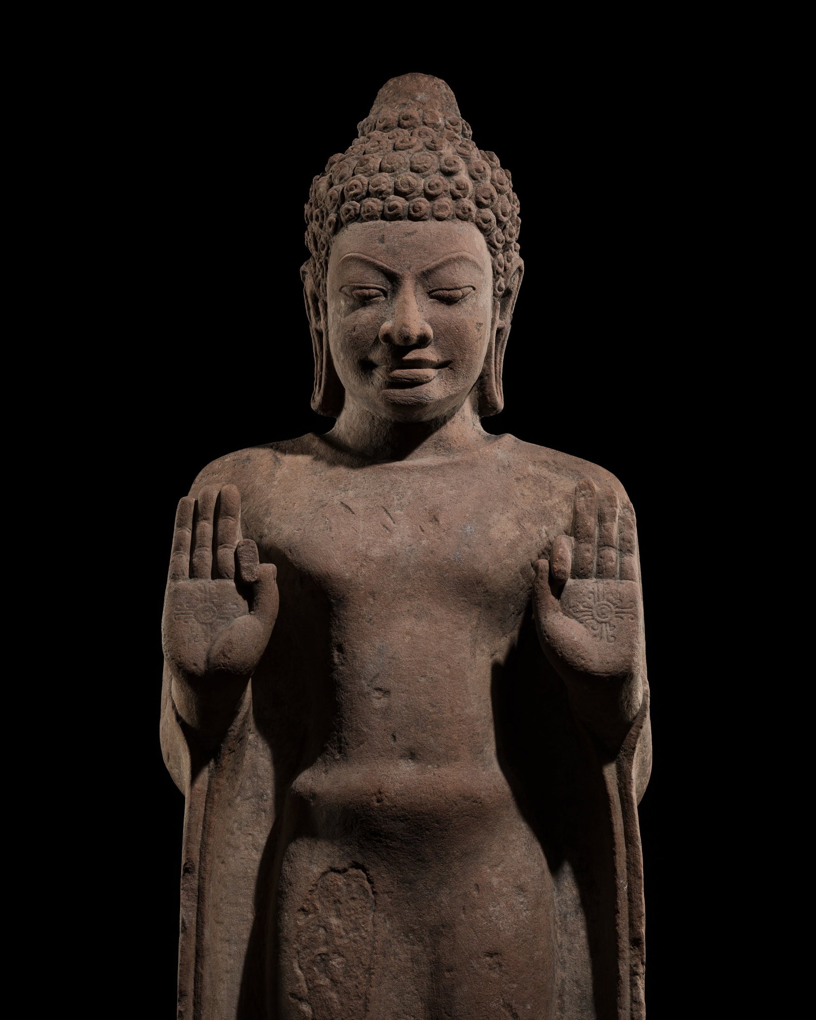 A VERY LARGE ROSE SANDSTONE FIGURE OF BUDDHA, MON-DVARAVATI PERIOD, 8TH-9TH CENTURY: A VERY LARGE ROSE SANDSTONE FIGURE OF BUDDHA, MON-DVARAVATI PERIOD, 8TH-9TH CENTURY This lot is from a single owner collection and is therefore offered without reserve The Jorgen Ruben Gallery Ledger,