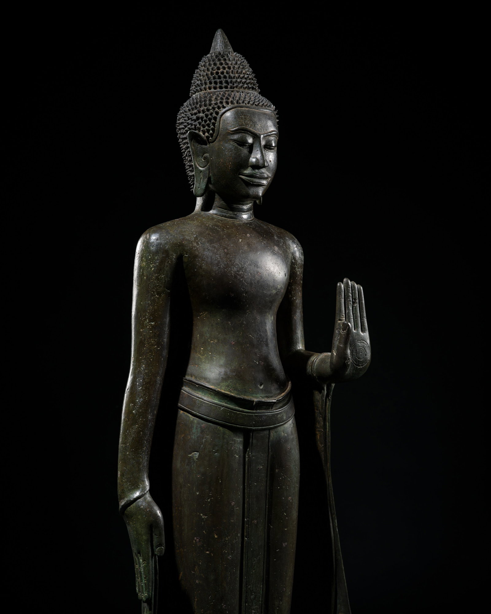 A LARGE BRONZE FIGURE OF BUDDHA SHAKYAMUNI, THAILAND, LOPBURI STYLE, 13TH CENTURY: A LARGE BRONZE FIGURE OF BUDDHA SHAKYAMUNI, THAILAND, LOPBURI STYLE, 13TH CENTURY This lot is from a single owner collection and is therefore offered without reserve The Jorgen Ruben Gallery Ledger, e