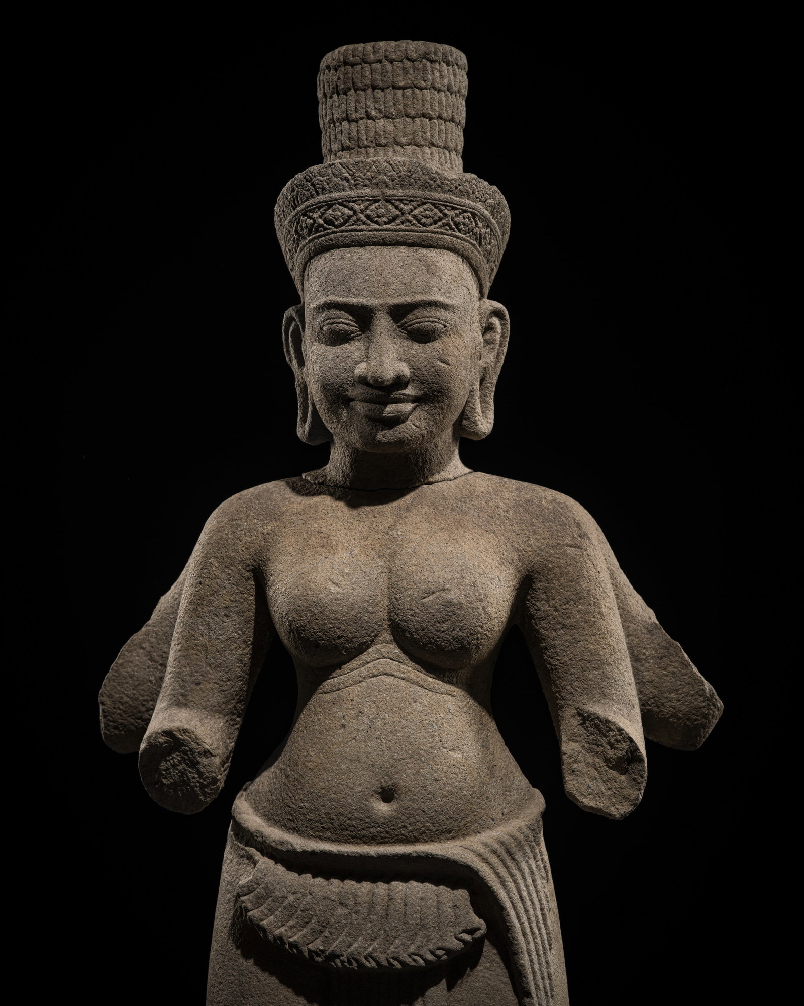 A RARE AND LARGE SANDSTONE FIGURE OF UMA, ANGKOR PERIOD, PREAH KO STYLE, 9TH CENTURY: A RARE AND LARGE SANDSTONE FIGURE OF UMA, ANGKOR PERIOD, PREAH KO STYLE, 9TH CENTURY This lot is from a single owner collection and is therefore offered without reserve The Jorgen Ruben Gallery Ledger