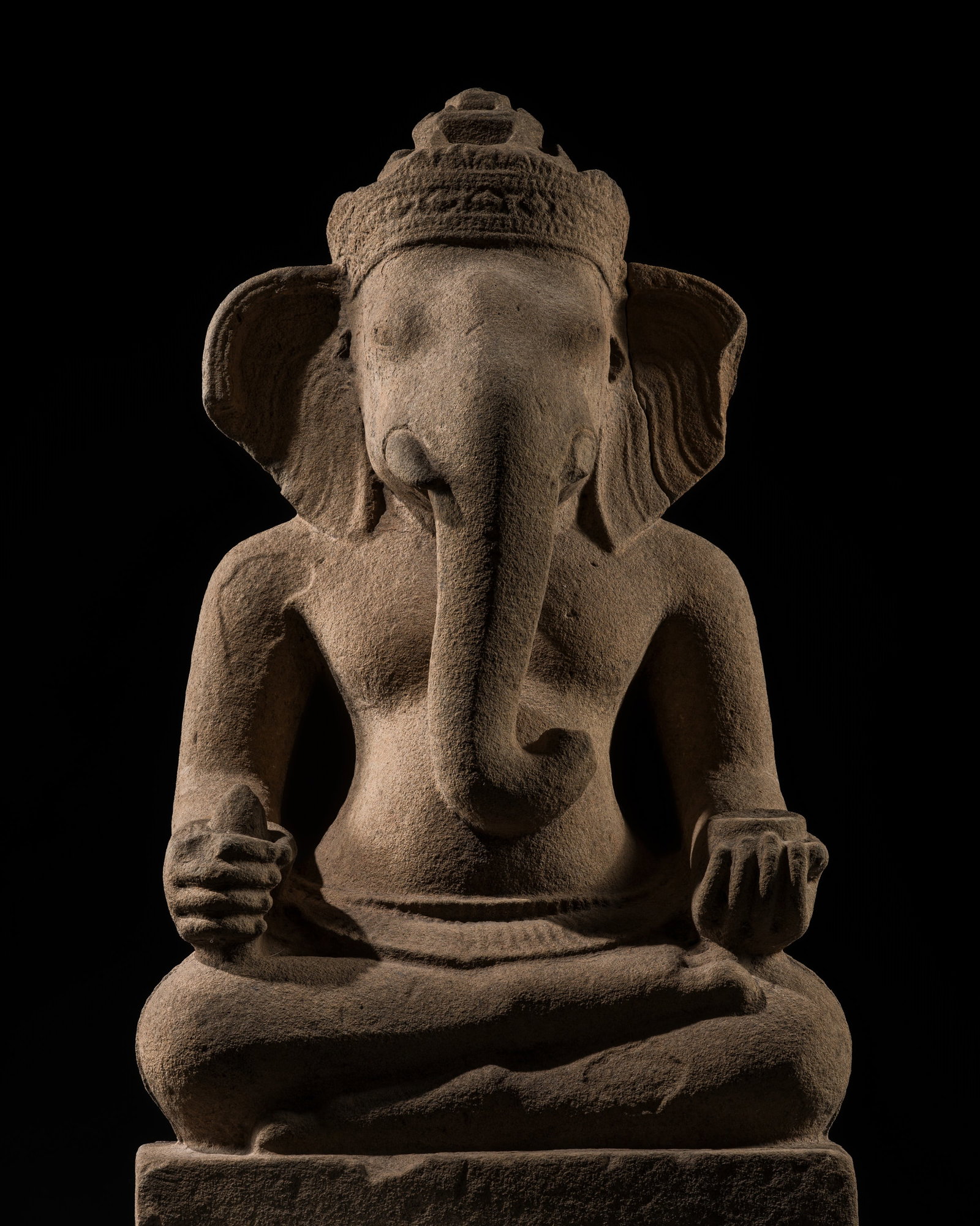 A LARGE SANDSTONE FIGURE OF GANESHA, KOH KER STYLE, 10TH CENTURY (1 of 16)