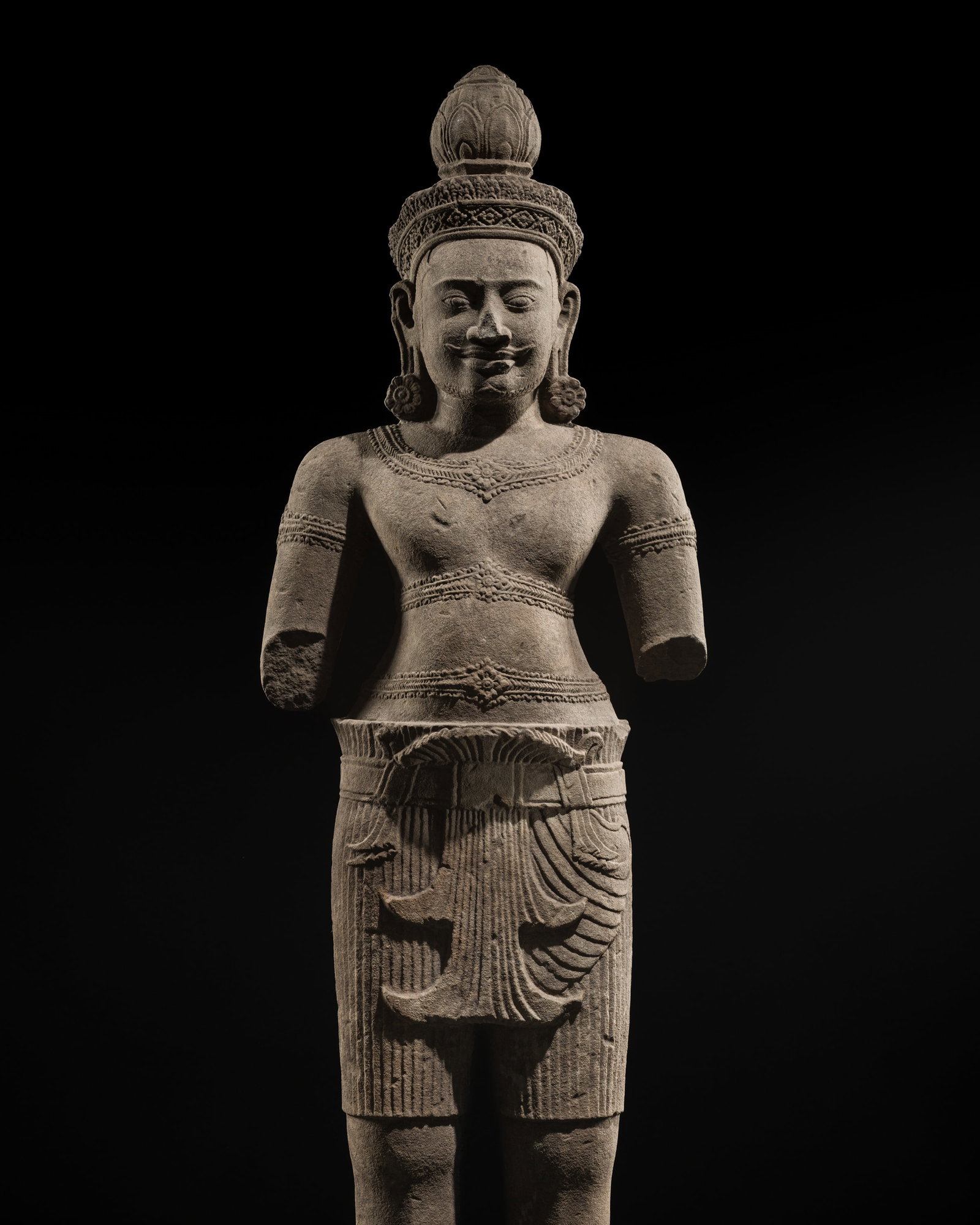 AN EXCEEDINGLY RARE AND LARGE SANDSTONE FIGURE OF VISHNU, BAKHENG STYLE, ANGKOR PERIOD, 10TH CENTURY (1 of 20)