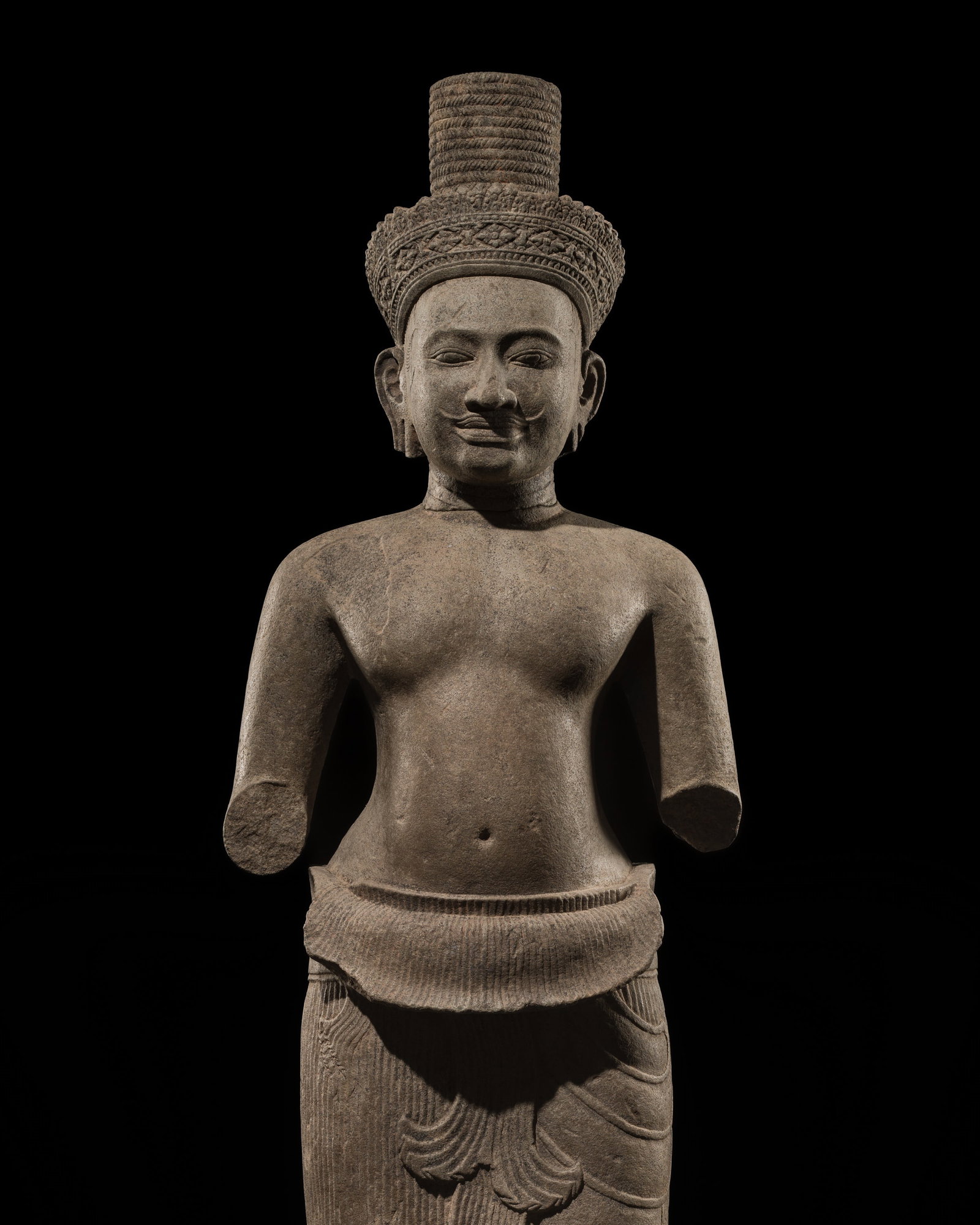 A RARE AND LARGE SANDSTONE FIGURE OF VISHNU, BANTEAY SREI STYLE, ANGKOR PERIOD, 10TH CENTURY: A RARE AND LARGE SANDSTONE FIGURE OF VISHNU, BANTEAY SREI STYLE, ANGKOR PERIOD, 10TH CENTURY This lot is from a single owner collection and is therefore offered without reserve The Jorgen Ruben Galler