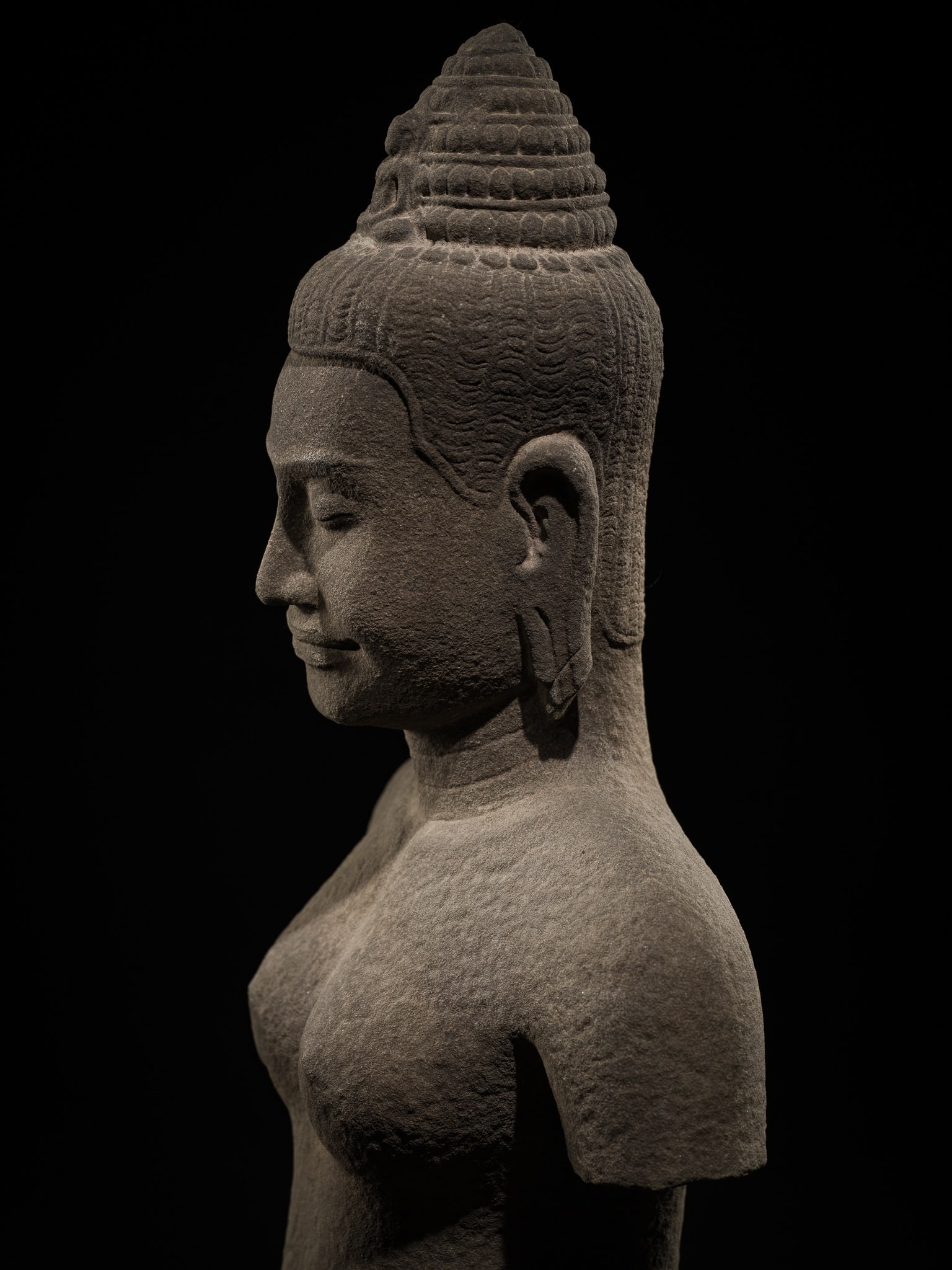 A LARGE SANDSTONE FIGURE OF PRAJNAPARAMITA, BAYON STYLE, ANGKOR PERIOD, LATE 12TH-EARLY 13TH CENTURY: A LARGE SANDSTONE FIGURE OF PRAJNAPARAMITA, BAYON STYLE, ANGKOR PERIOD, LATE 12TH-EARLY 13TH CENTURY This lot is from a single owner collection and is therefore offered without reserve The Jorgen Rube