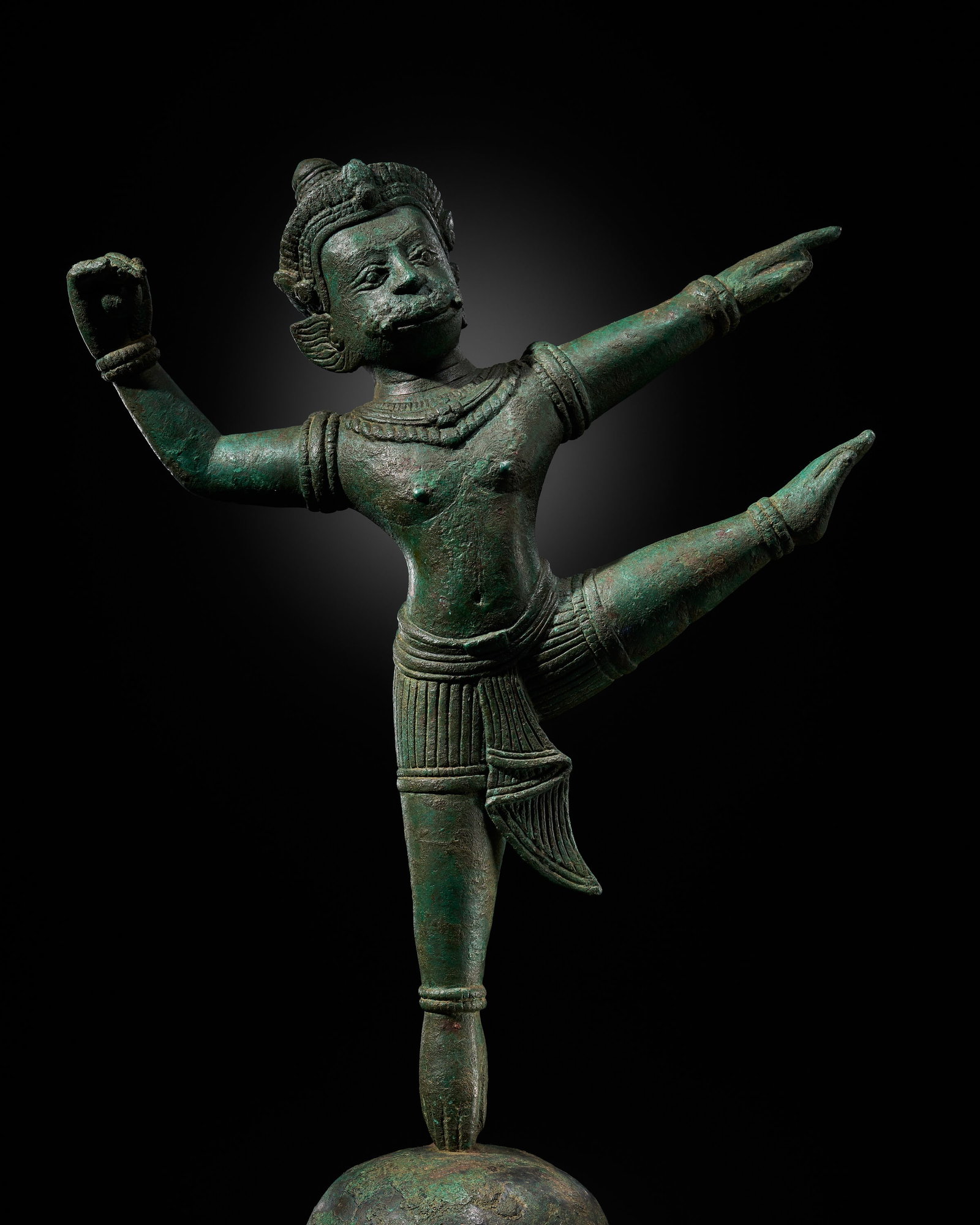 A RARE KHMER BRONZE FIGURE OF HANUMAN, BAYON STYLE, ANGKOR PERIOD, 12TH-13TH CENTURY: A RARE KHMER BRONZE FIGURE OF HANUMAN, BAYON STYLE, ANGKOR PERIOD, 12TH-13TH CENTURY This lot is from a single owner collection and is therefore offered without reserve The Jorgen Ruben Gallery Ledger