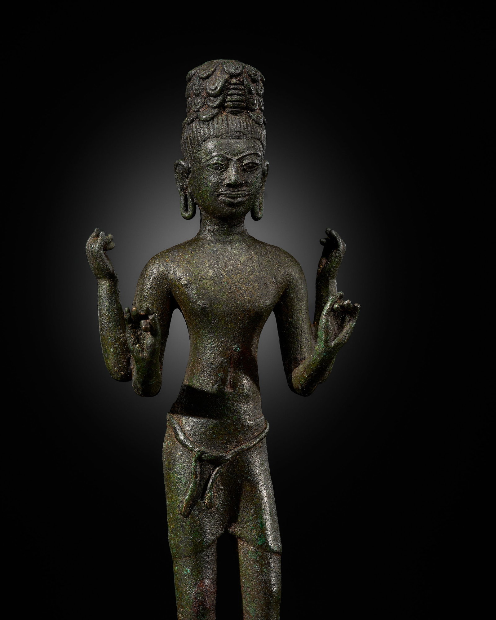 A RARE BRONZE FIGURE OF MAITREYA, PROBABLY FROM THE 'PRAKHON CHAI HOARD', PRE-ANGKOR, 8TH-9TH: A RARE BRONZE FIGURE OF MAITREYA, PROBABLY FROM THE 'PRAKHON CHAI HOARD', PRE-ANGKOR, 8TH-9TH CENTURY This lot is from a single owner collection and is therefore offered without reserve Standing in sl