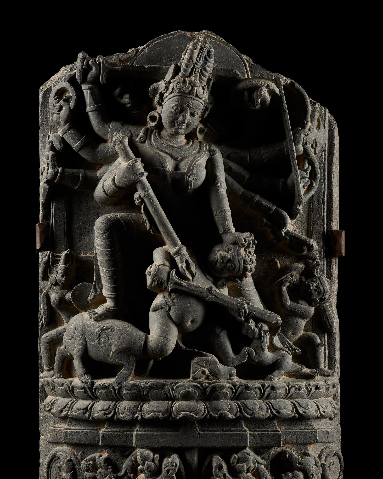 A FINE BLACK STONE STELE OF DURGA MAHISHASURAMARDINI, PALA PERIOD, 11TH-12TH CENTURY: A FINE BLACK STONE STELE OF DURGA MAHISHASURAMARDINI, PALA PERIOD, 11TH-12TH CENTURY This lot is from a single owner collection and is therefore offered without reserve Northeastern India. Finely and 