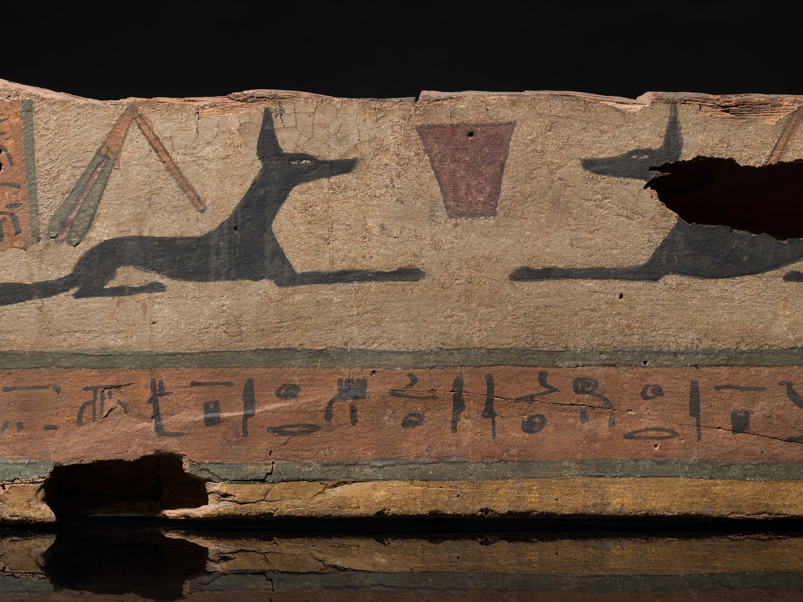 AN EGYPTIAN POLYCHROME WOOD 'ANUBIS' SARCOPHAGUS FRAGMENT, LATE PERIOD-PTOLEMAIC PERIOD: AN EGYPTIAN POLYCHROME WOOD 'ANUBIS' SARCOPHAGUS FRAGMENT, LATE PERIOD-PTOLEMAIC PERIOD This lot is from a single owner collection and is therefore offered without reserve The Jorgen Ruben Gallery Led