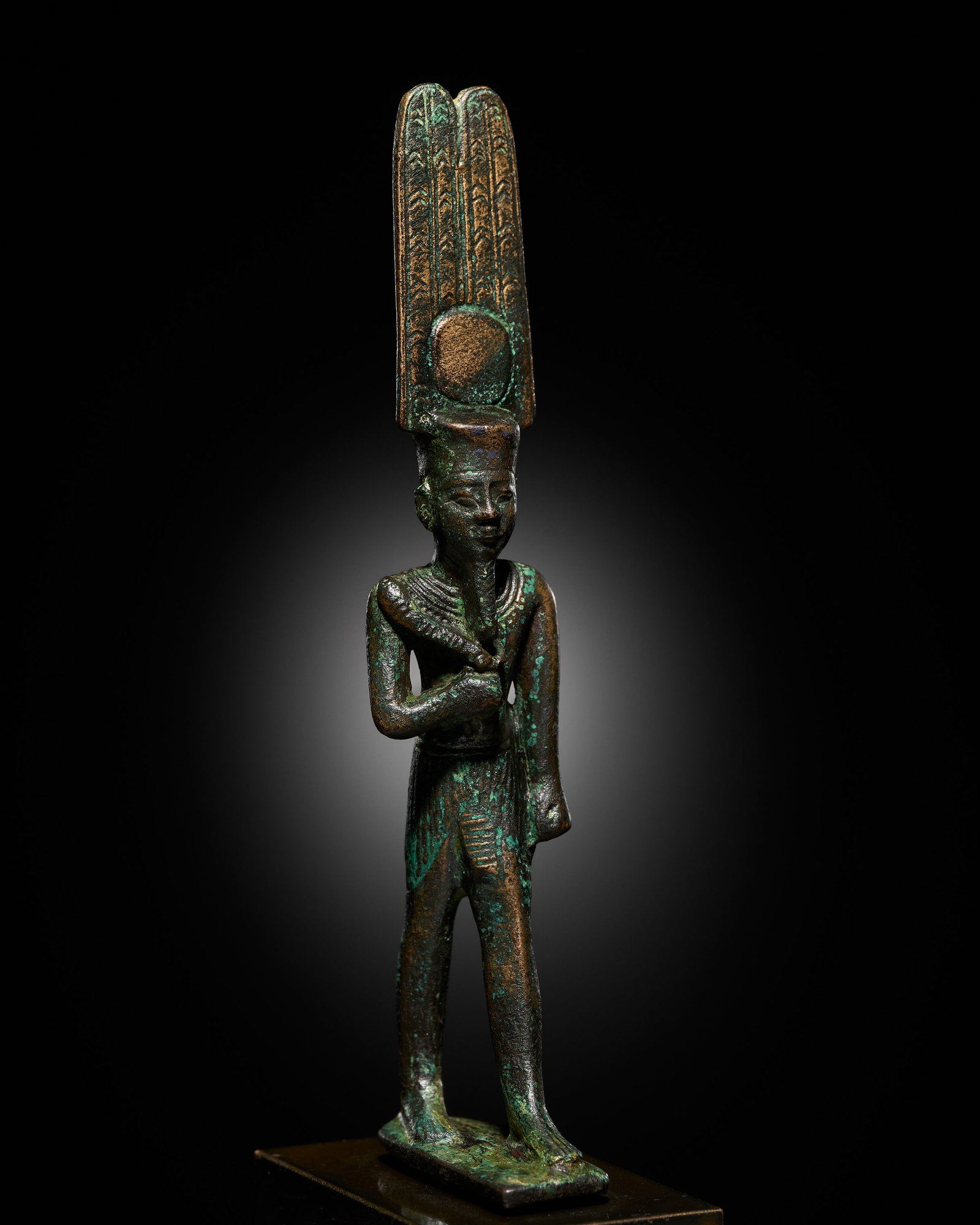 AN EGYPTIAN BRONZE FIGURE OF AMEN-RA, LATE PERIOD (1 of 14)