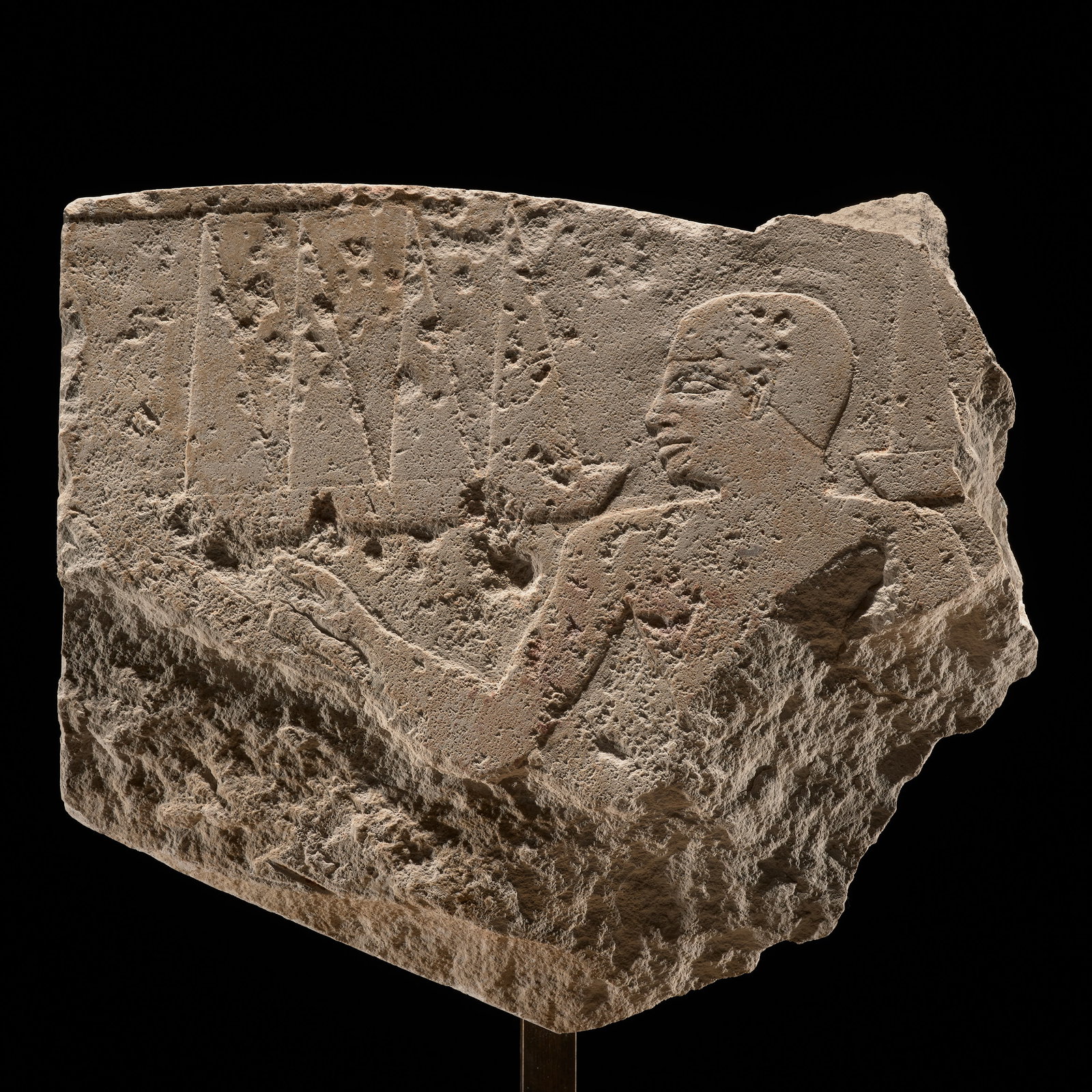 AN EGYPTIAN LIMESTONE RELIEF FRAGMENT DEPICTING AN OFFERING SCENE, OLD KINGDOM, 5TH-6TH DYNASTY: AN EGYPTIAN LIMESTONE RELIEF FRAGMENT DEPICTING AN OFFERING SCENE, OLD KINGDOM, 5TH-6TH DYNASTY This lot is from a single owner collection and is therefore offered without reserve The Jorgen Ruben Gal