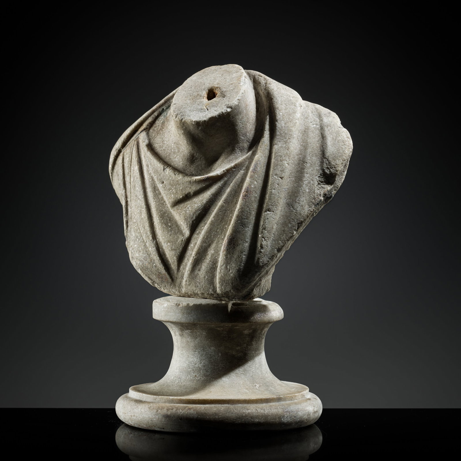 A ROMAN MARBLE BUST OF A MAN DRESSED IN AN IMPERIAL TOGA, CIRCA 1ST-2ND CENTURY AD (1 of 18)