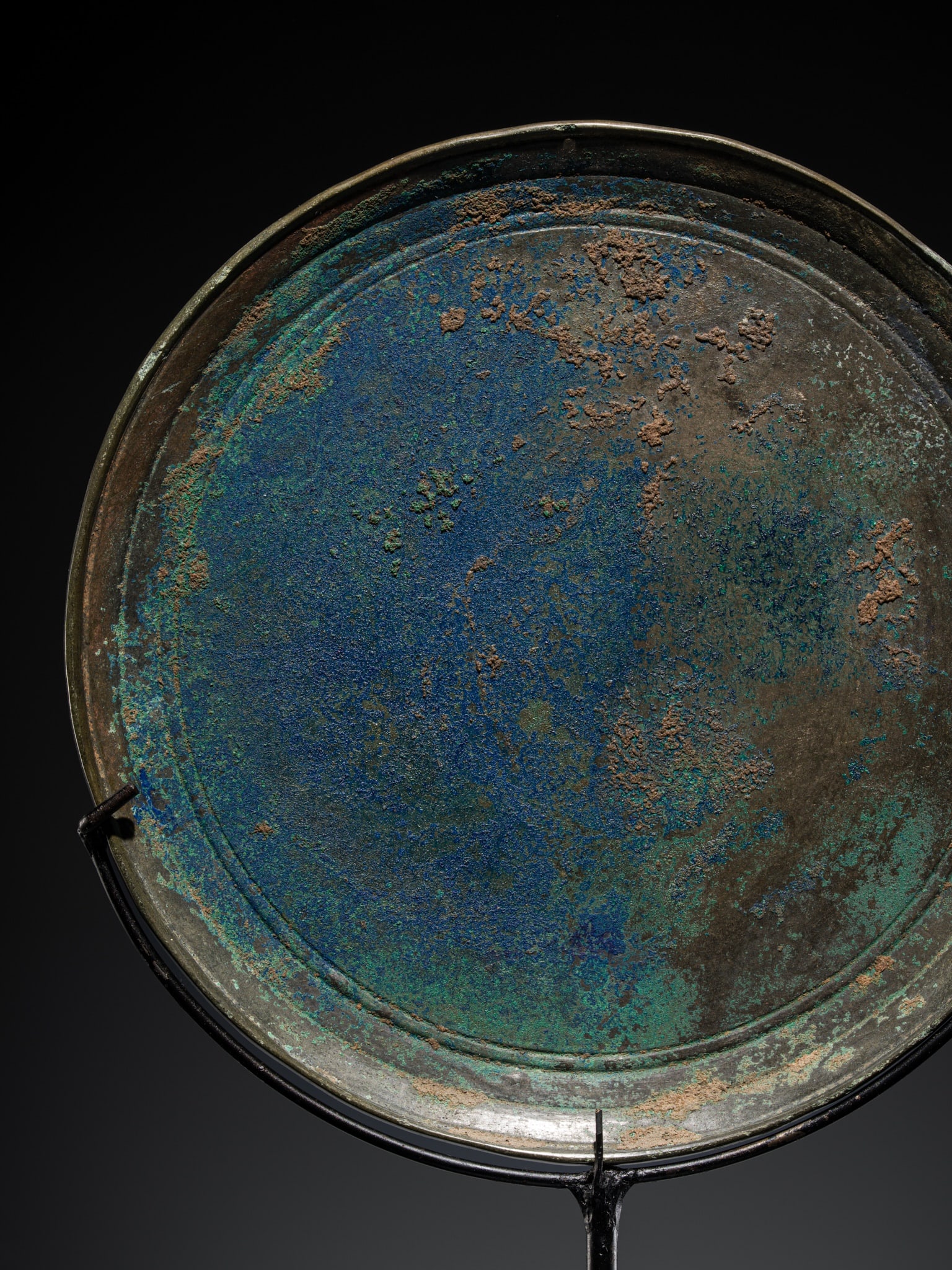 A VERY RARE BRONZE MIRROR, ANGKOR PERIOD, 12TH CENTURY: A VERY RARE BRONZE MIRROR, ANGKOR PERIOD, 12TH CENTURY This lot is from a single owner collection and is therefore offered without reserve The Jorgen Ruben Gallery Ledger, entry from 2005: “No. 