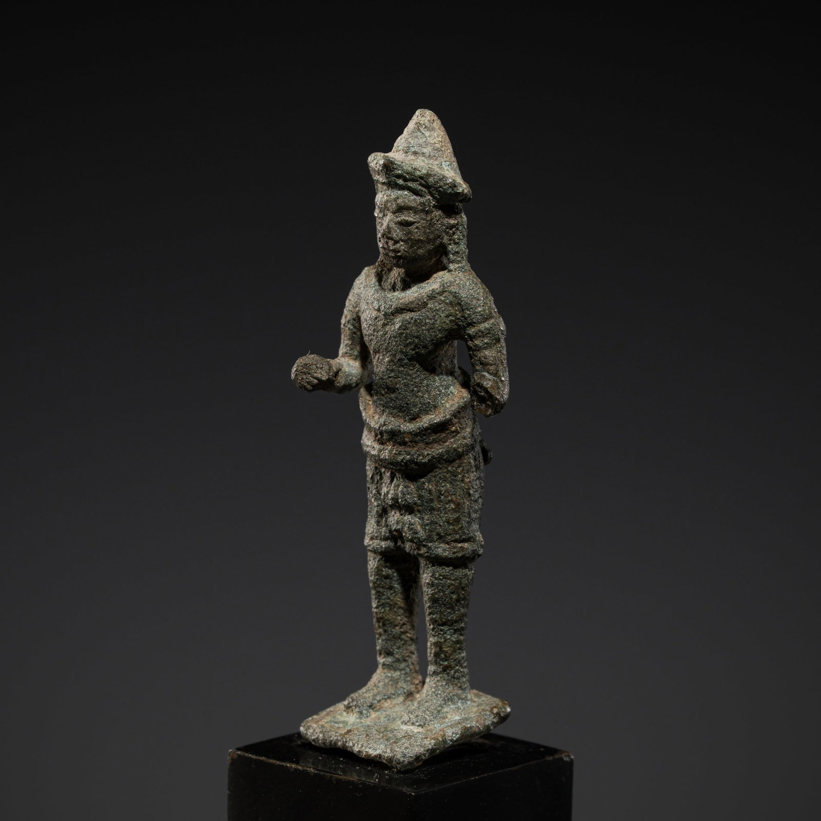 A SMALL BRONZE FIGURE OF A MALE DEITY, ANGKOR WAT STYLE, 12TH CENTURY: A SMALL BRONZE FIGURE OF A MALE DEITY, ANGKOR WAT STYLE, 12TH CENTURY This lot is from a single owner collection and is therefore offered without reserve The Jorgen Ruben Gallery Ledger, entry from 20