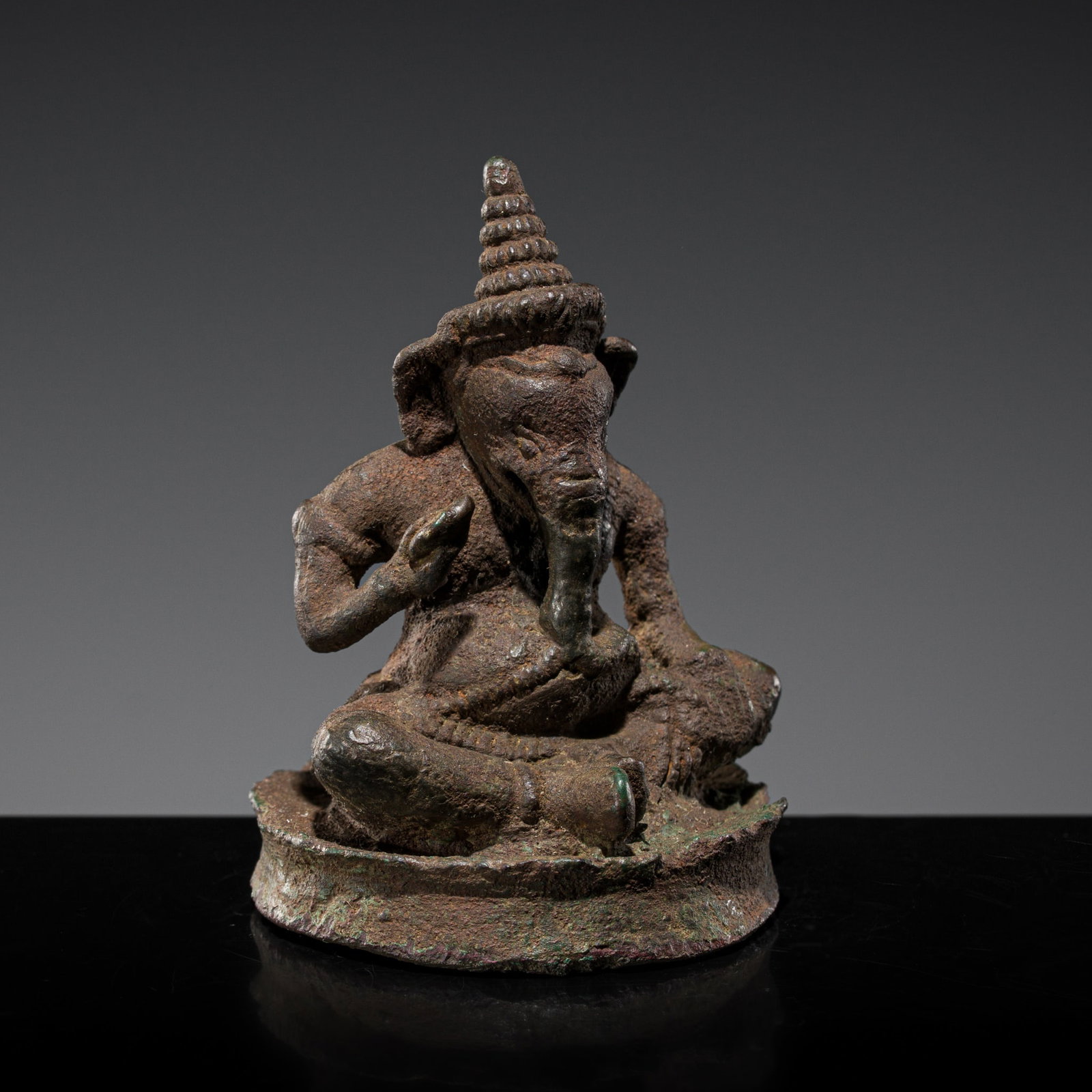 A SMALL BRONZE FIGURE OF GANESHA, BAYON STYLE, 12TH-13TH CENTURY (1 of 12)