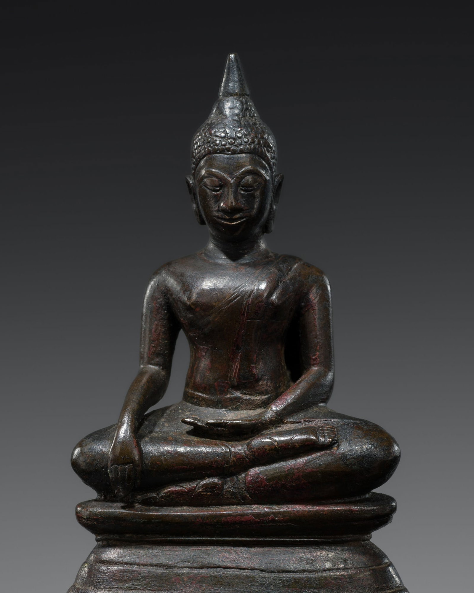 A FINE BRONZE FIGURE OF BUDDHA MARAVIJAYA, AYUTTHAYA PERIOD, 16TH CENTURY: A FINE BRONZE FIGURE OF BUDDHA MARAVIJAYA, AYUTTHAYA PERIOD, 16TH CENTURY This lot is from a single owner collection and is therefore offered without reserve The Jorgen Ruben Gallery Ledger, entry fro