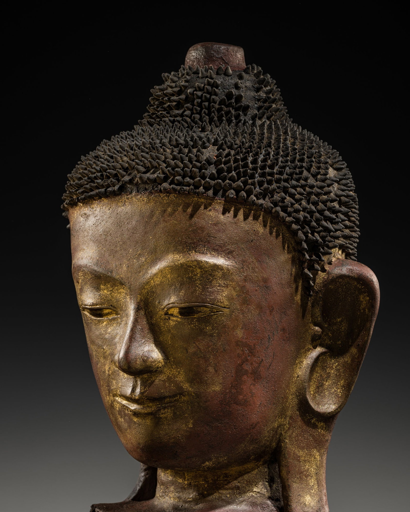 A MONUMENTAL DRY LACQUER HEAD OF BUDDHA, AVA STYLE, 17TH CENTURY: A MONUMENTAL DRY LACQUER HEAD OF BUDDHA, AVA STYLE, 17TH CENTURY This lot is from a single owner collection and is therefore offered without reserve The Jorgen Ruben Gallery Ledger, entry from 2005: &