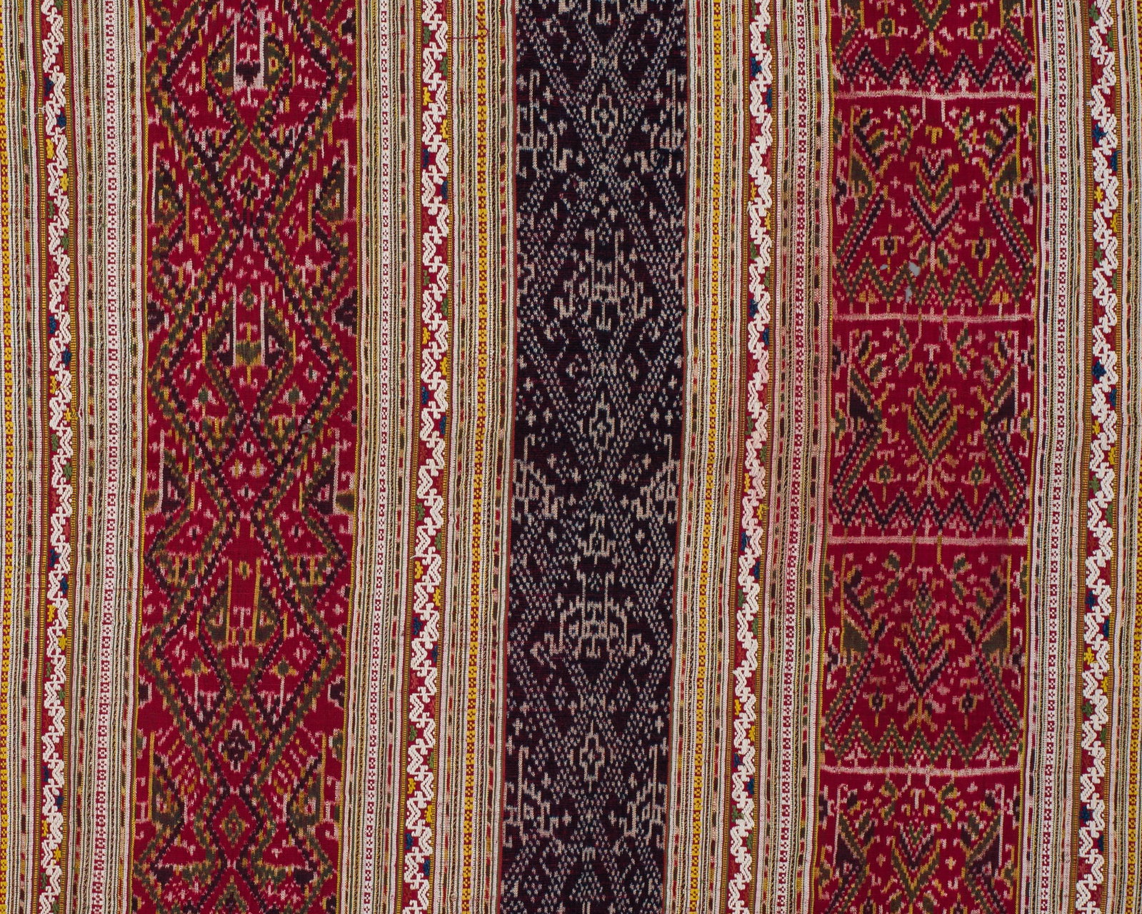 A FINE SILK IKAT WOMAN'S CEREMONIAL SKIRT (SARONG), TAI NUEA PEOPLE: A FINE SILK IKAT WOMAN'S CEREMONIAL SKIRT (SARONG), TAI NUEA PEOPLE This lot is from a single owner collection and is therefore offered without reserve Northeast Laos, Hua Phan Province, late 19th to 